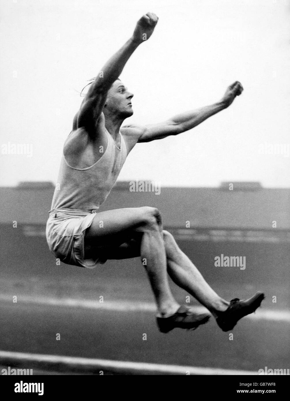 Athletics - Cambridge University Training - Stamford Bridge. Bob Tisdall practises the long jump Stock Photo