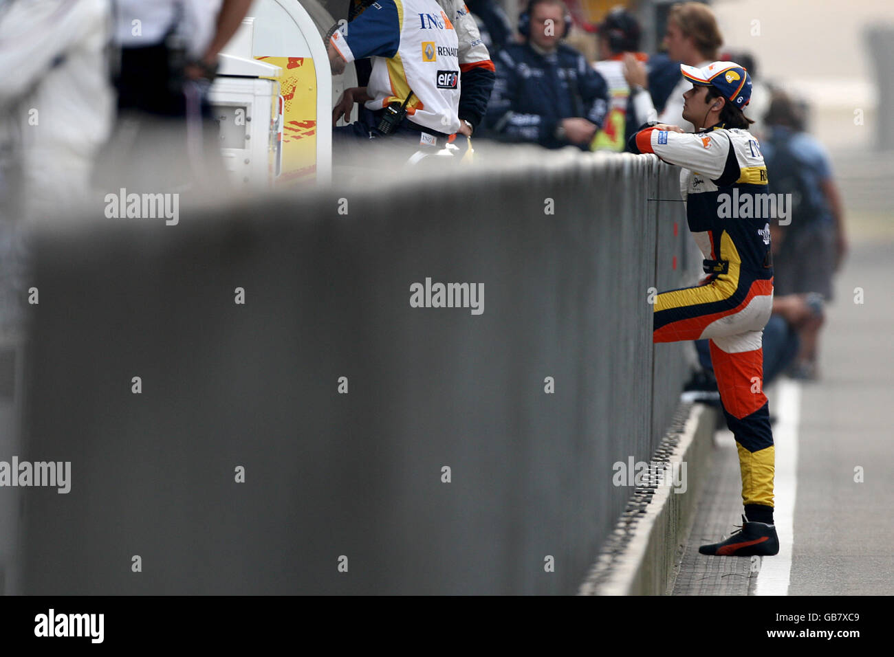 Renault's Nelsinho Piquet leans on the pit wall during the Formula One Sinopec Chinese Grand Prix at the Shanghai International Circuit, China. Stock Photo