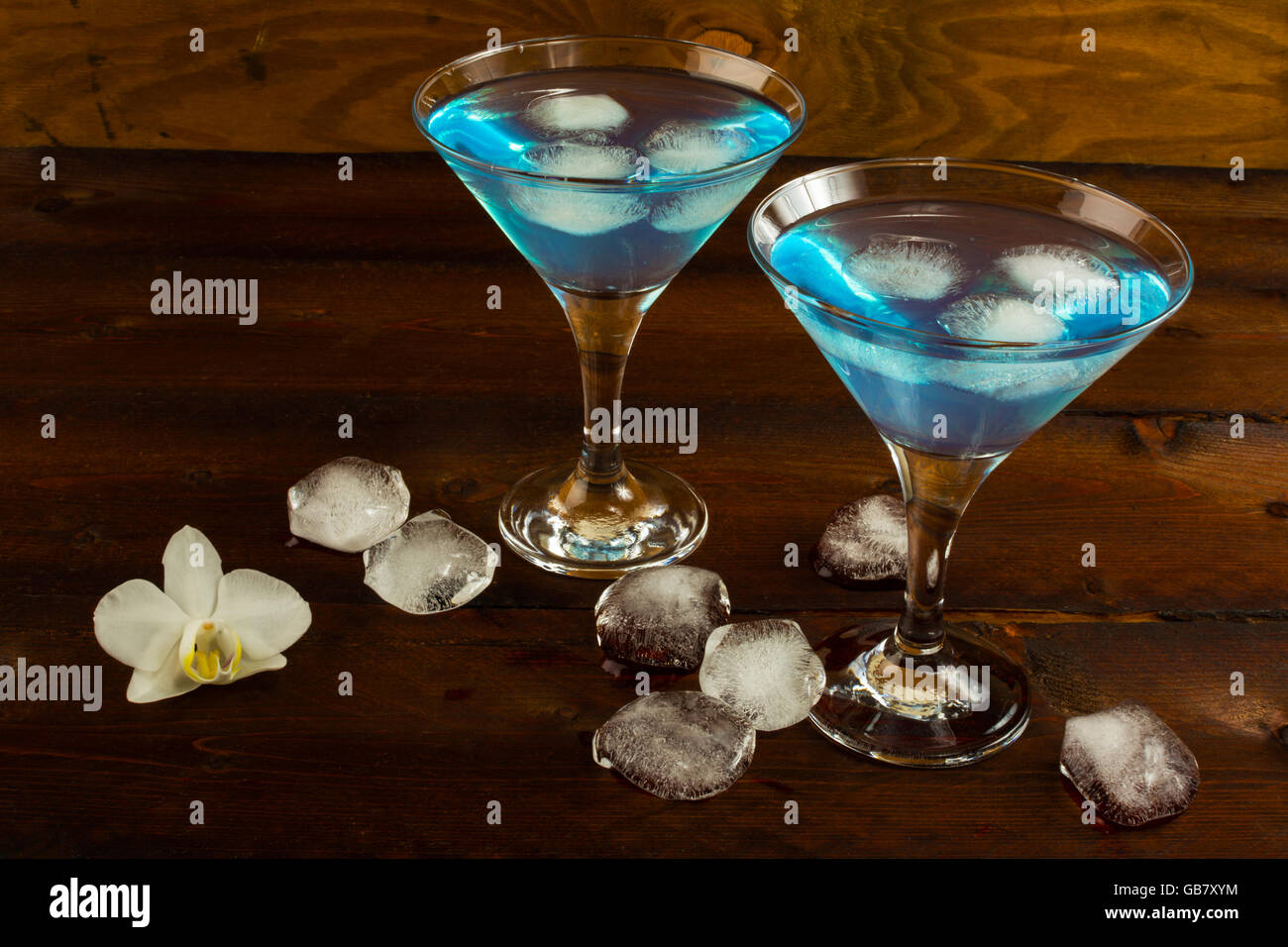 Blue cocktail in a martini glasses. Blue cocktail. Blue Martini. Blue