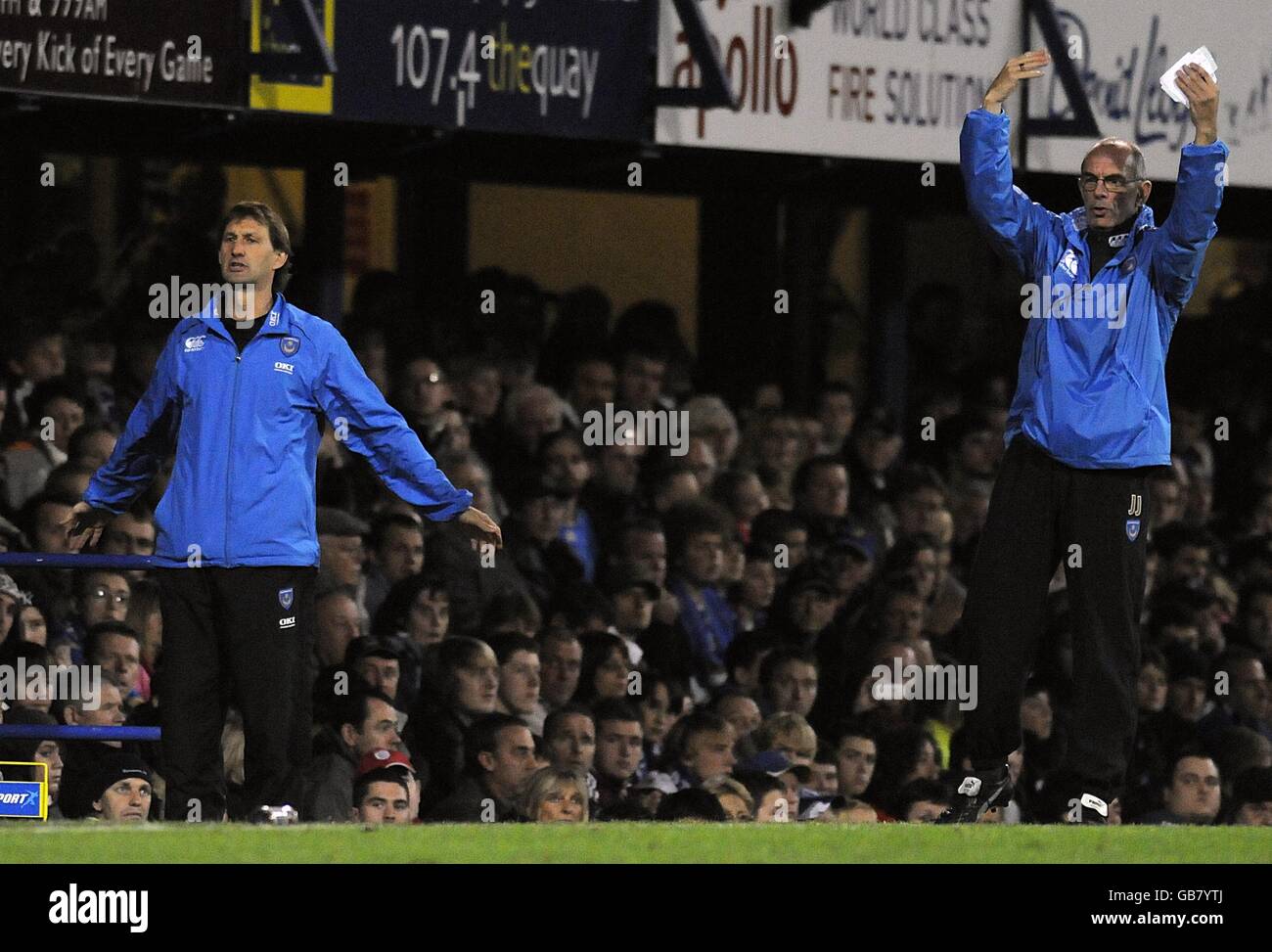 Portsmouth assistant manager Joe Jordan (right) and assisntant manager Tony Adams, on the touchline during the match. Stock Photo