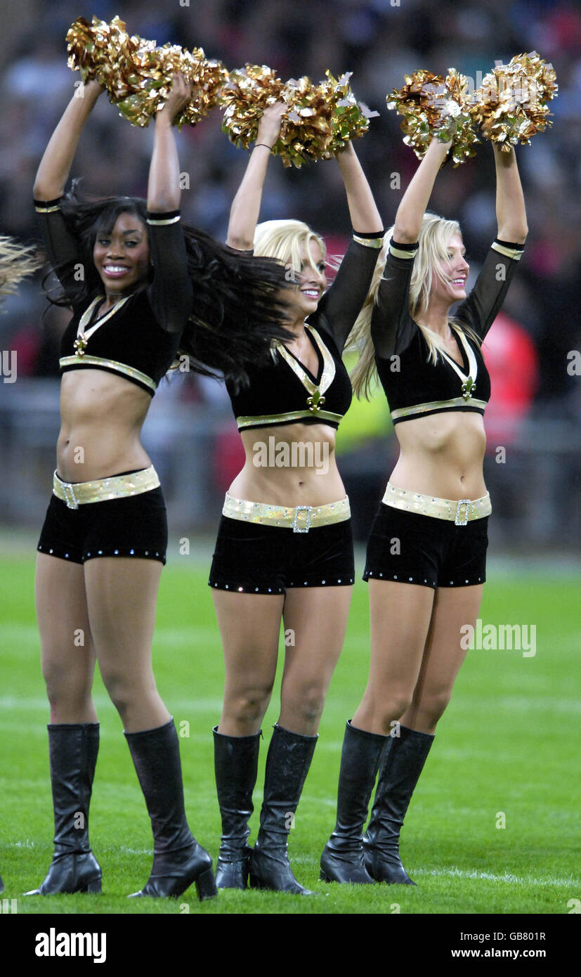 The New Orleans Saints cheerleaders 'The Saintsations' during the NFL match at Wembley Stadium, London. Stock Photo