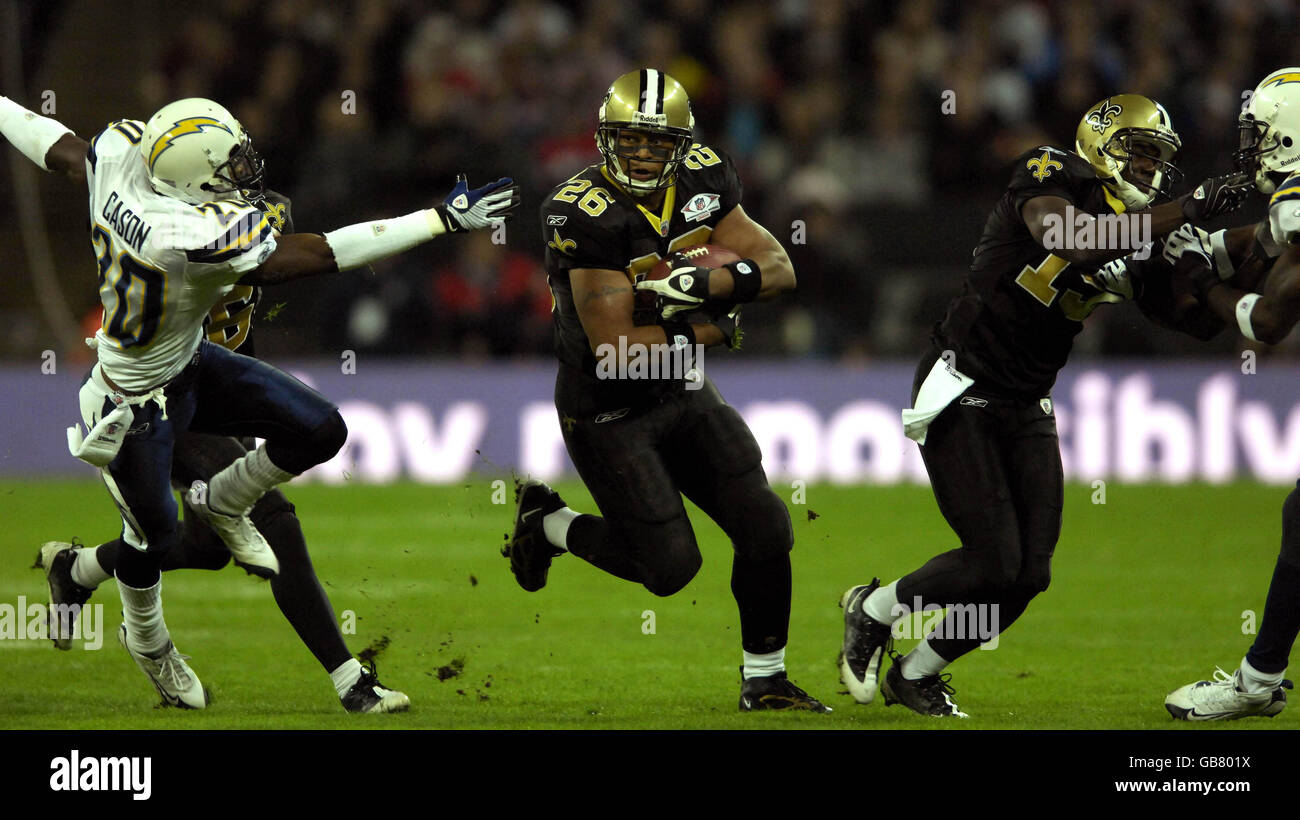 New Orleans Saints Running Back Deuce McAllister breaks through the San