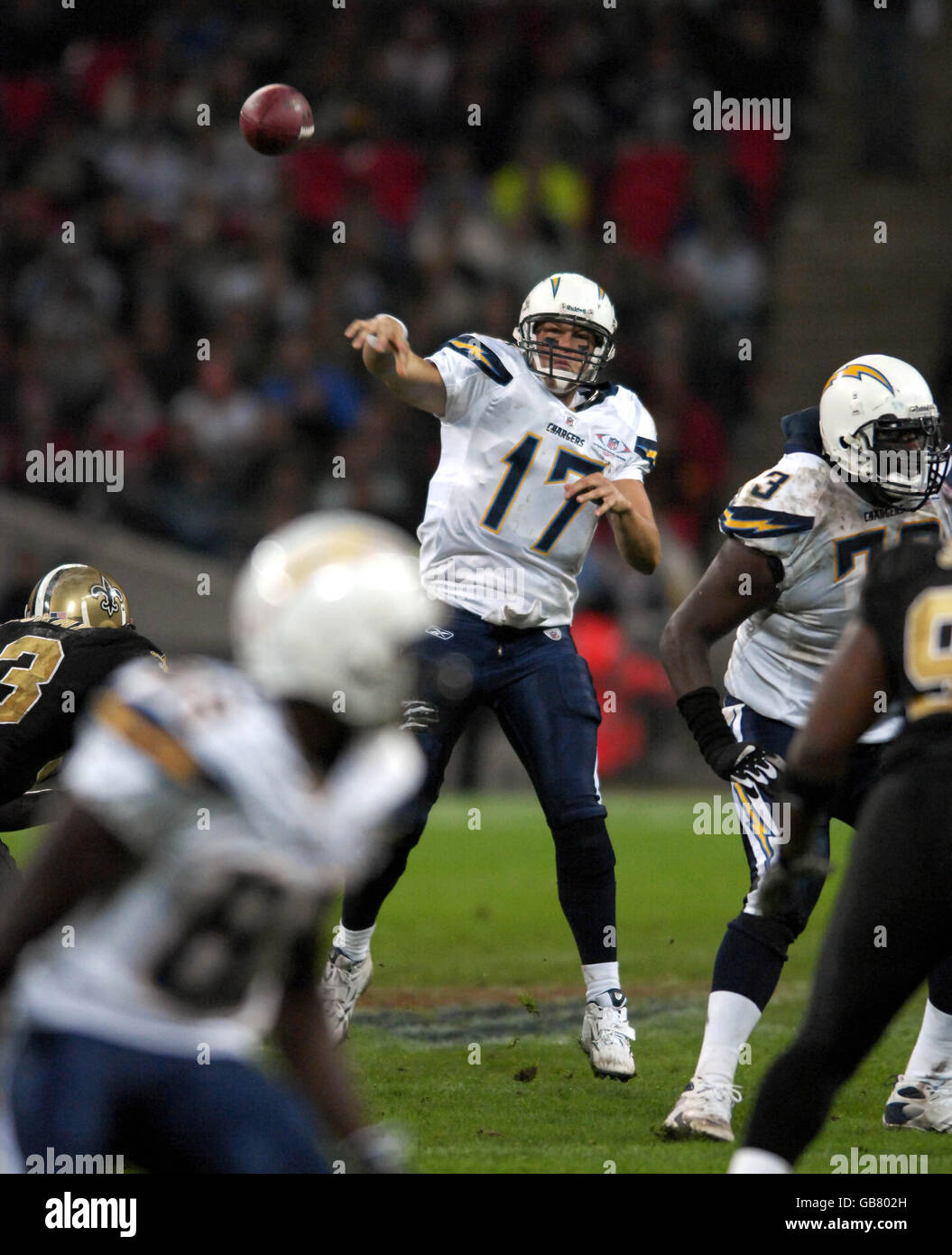 American Football - NFL - San Diego Chargers v New Orleans Saints - Wembley Stadium. San Diego Chargers Quarterback Philip Rivers attempts a throw during the NFL match at Wembley Stadium, London. Stock Photo