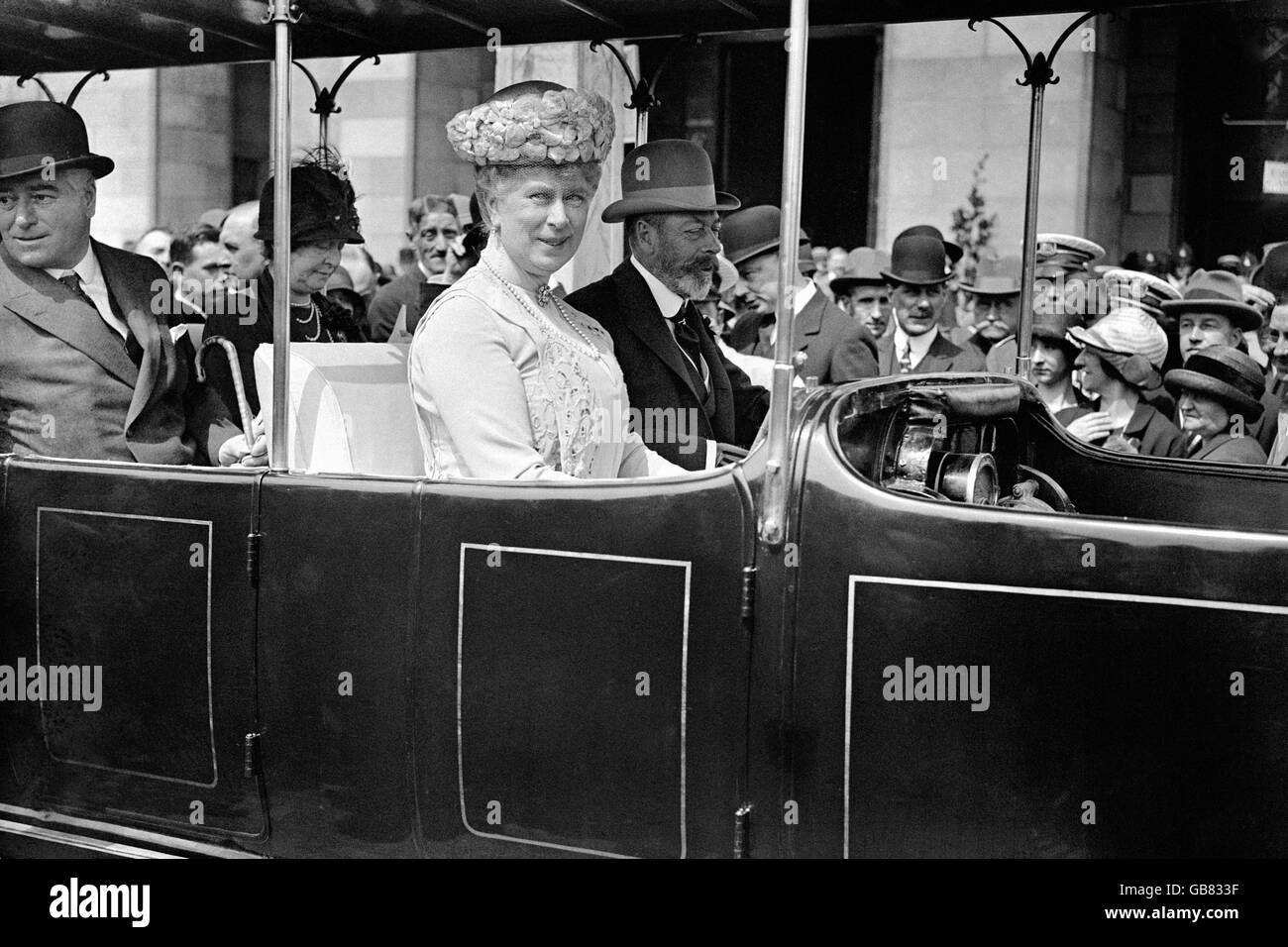British Royalty - King George V and Queen Mary - London - 1925. King George V and Queen Mary travelling in the Railodok car at the British Empire Exhibition, Wembley. Stock Photo