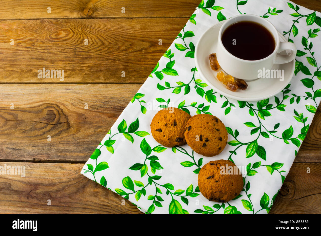 Tea cup and biscuits, top view. Breakfast cookies. Sweet pastry Stock Photo