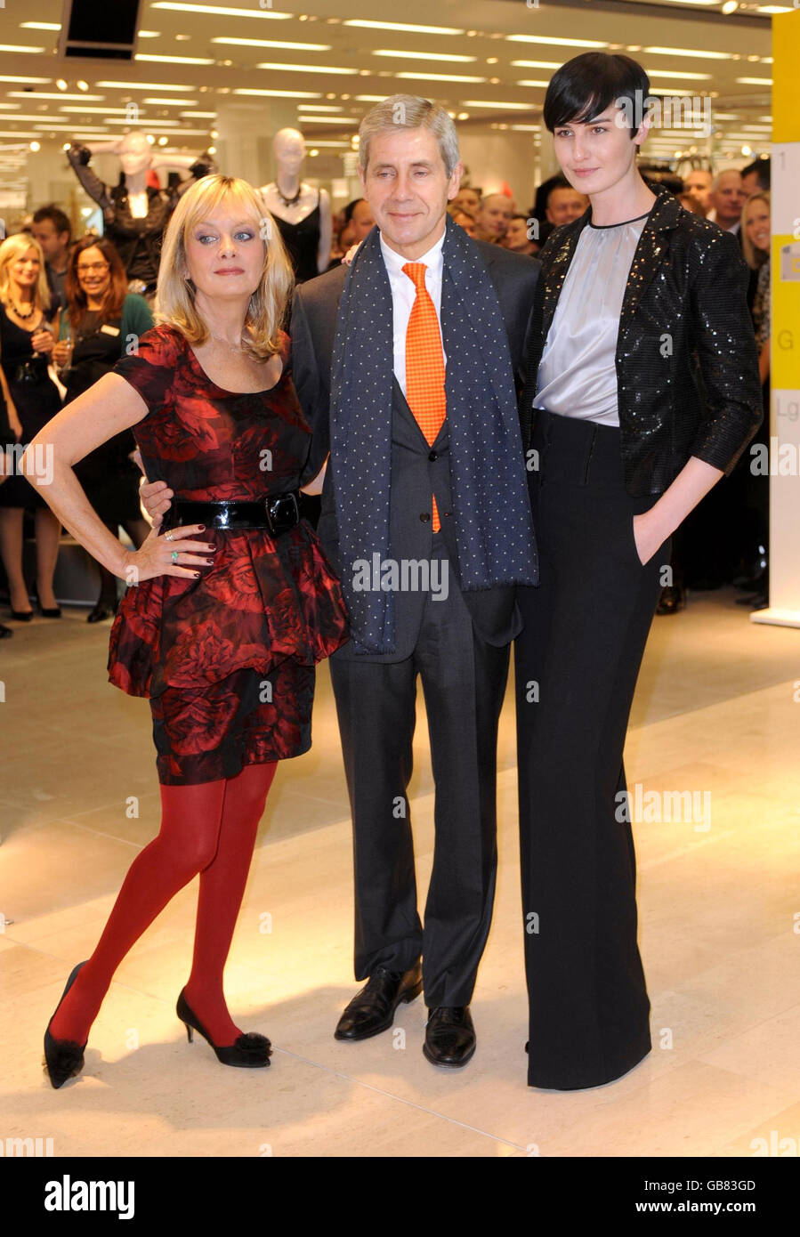 (From left to right) Twiggy, Stuart Rose of Marks and Spencer and Erin O'Connor officially unveil the Marks and Spencer store during the official opening of the Westfield Shopping Centre in White City, west London, on its opening day. Stock Photo