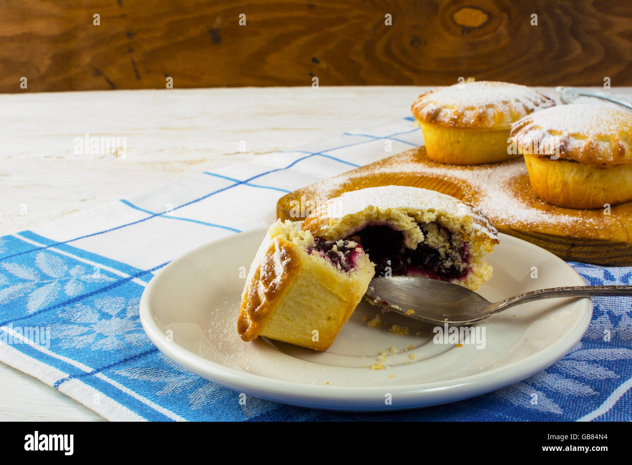 Confiture dessert on the white plate. Sweet dessert. Sweet pastry. Small pie. Pie. Jam pie Stock Photo