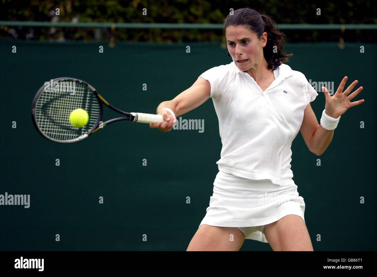 Tennis - Wimbledon 2003 - Second Round - Vera Zvonareva v Iroda Tulyaganova Stock Photo