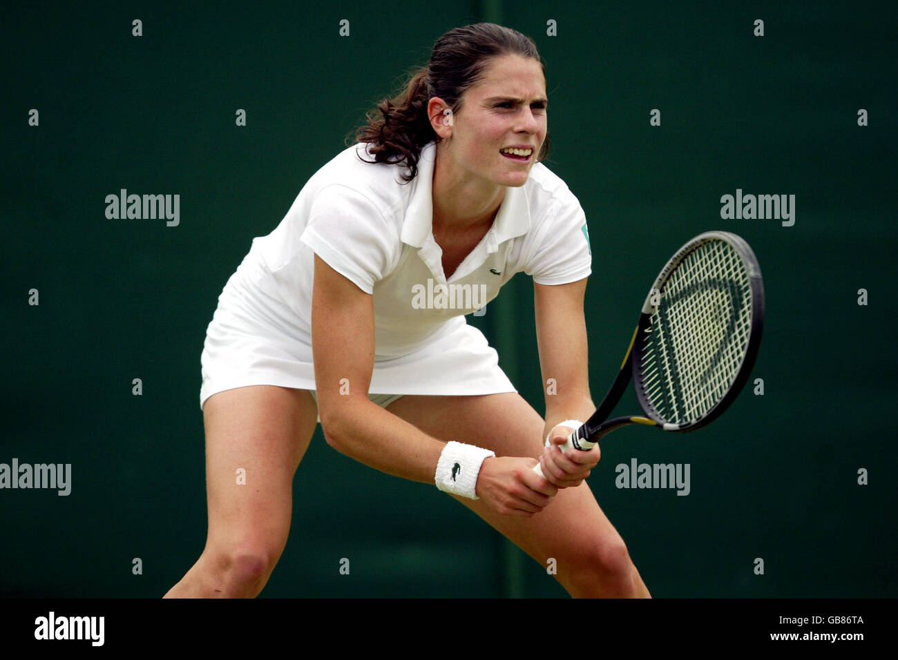 Tennis - Wimbledon 2003 - Second Round - Vera Zvonareva v Iroda Tulyaganova. Iroda Tulyaganova makes a return Stock Photo