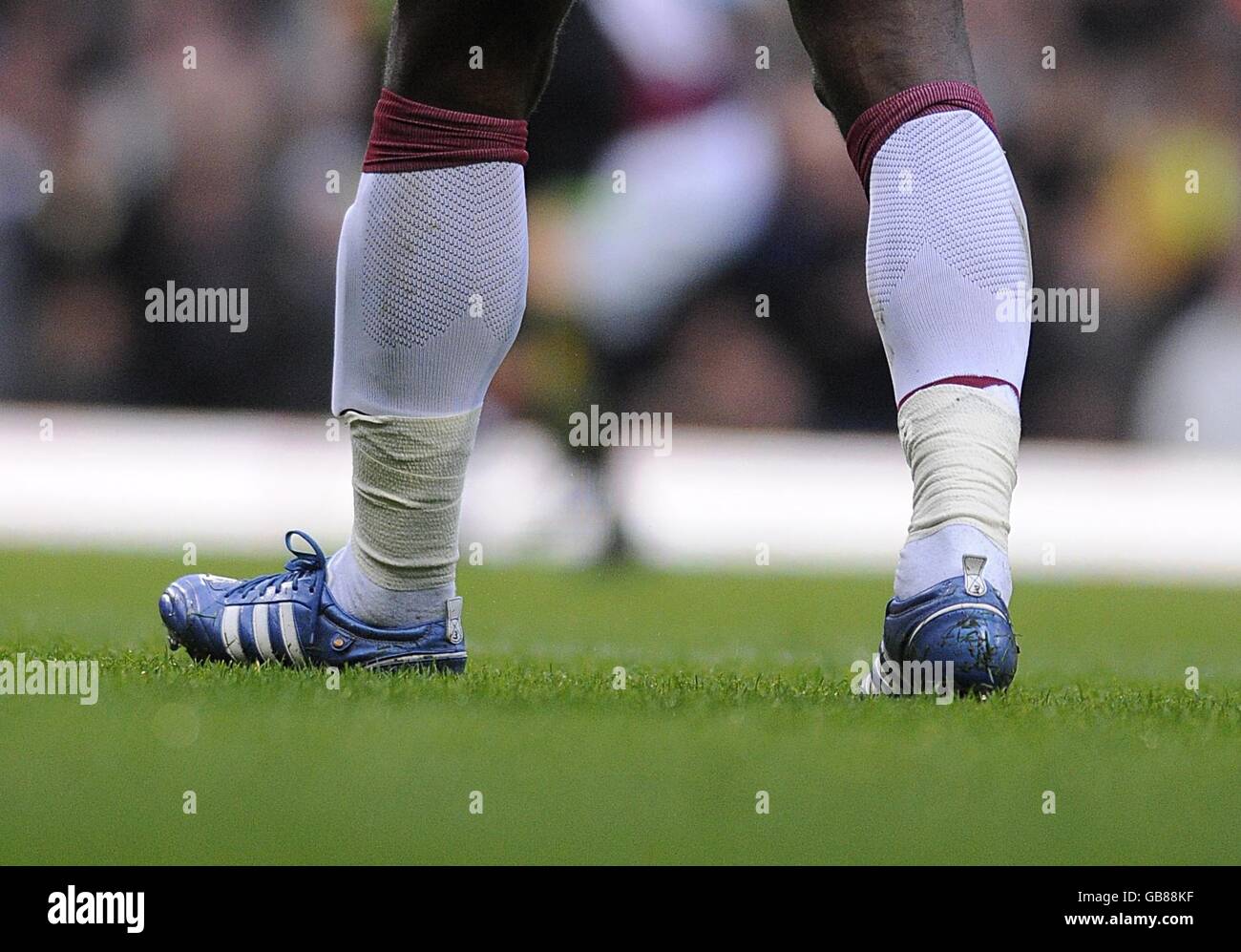 Wearing football boots hi-res stock photography and images - Alamy