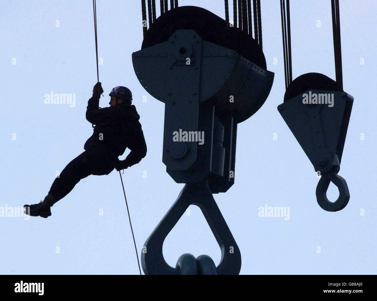 A fundraiser takes part in a sponsored 150-foot abseil off the Titan Crane, near Glasgow, to raise money for Deafblind Scotland and St Margaret's Hospice. Stock Photo