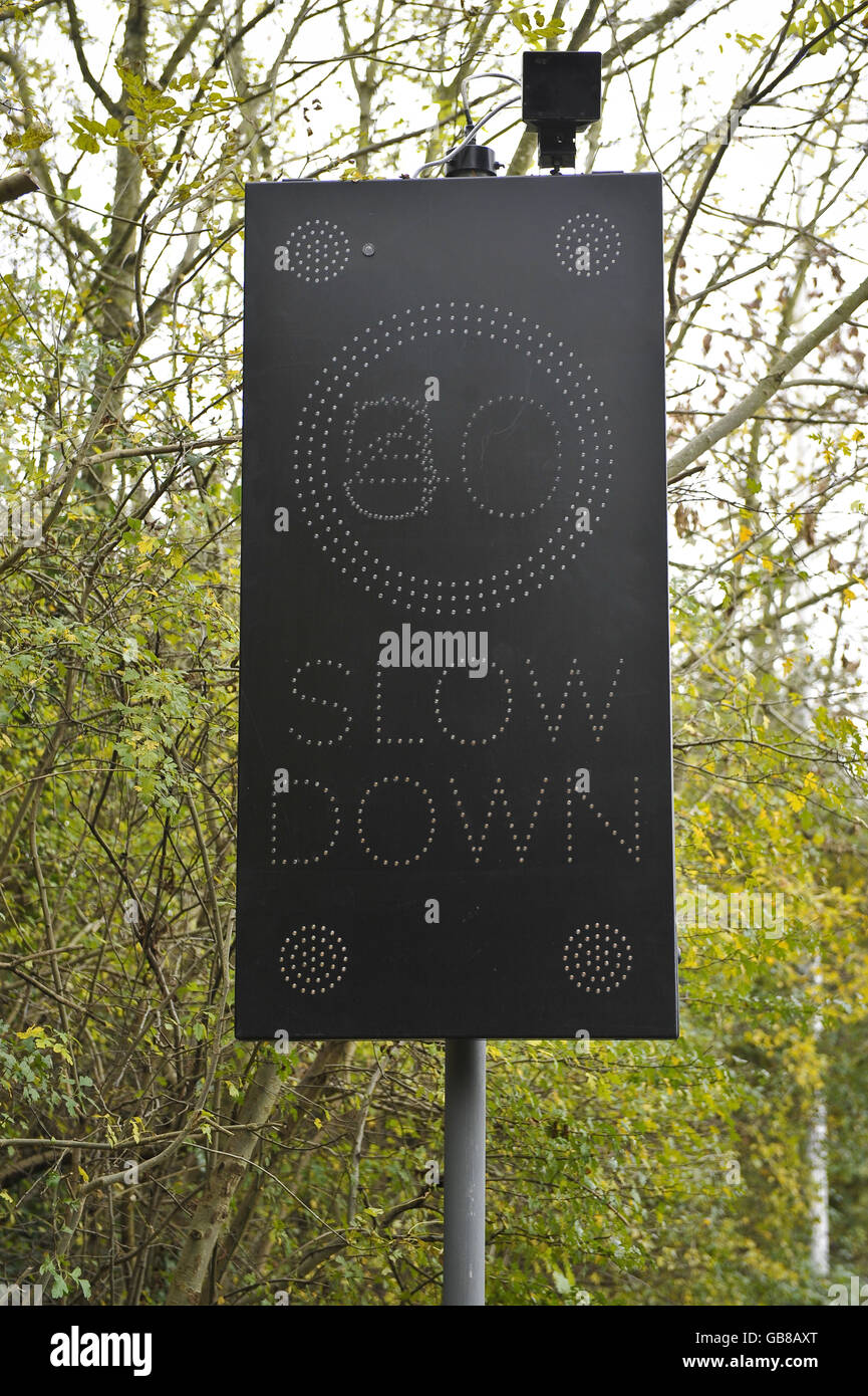 Stock, Speed Camera's. An electronic speed limit sign showing 30mph Stock Photo