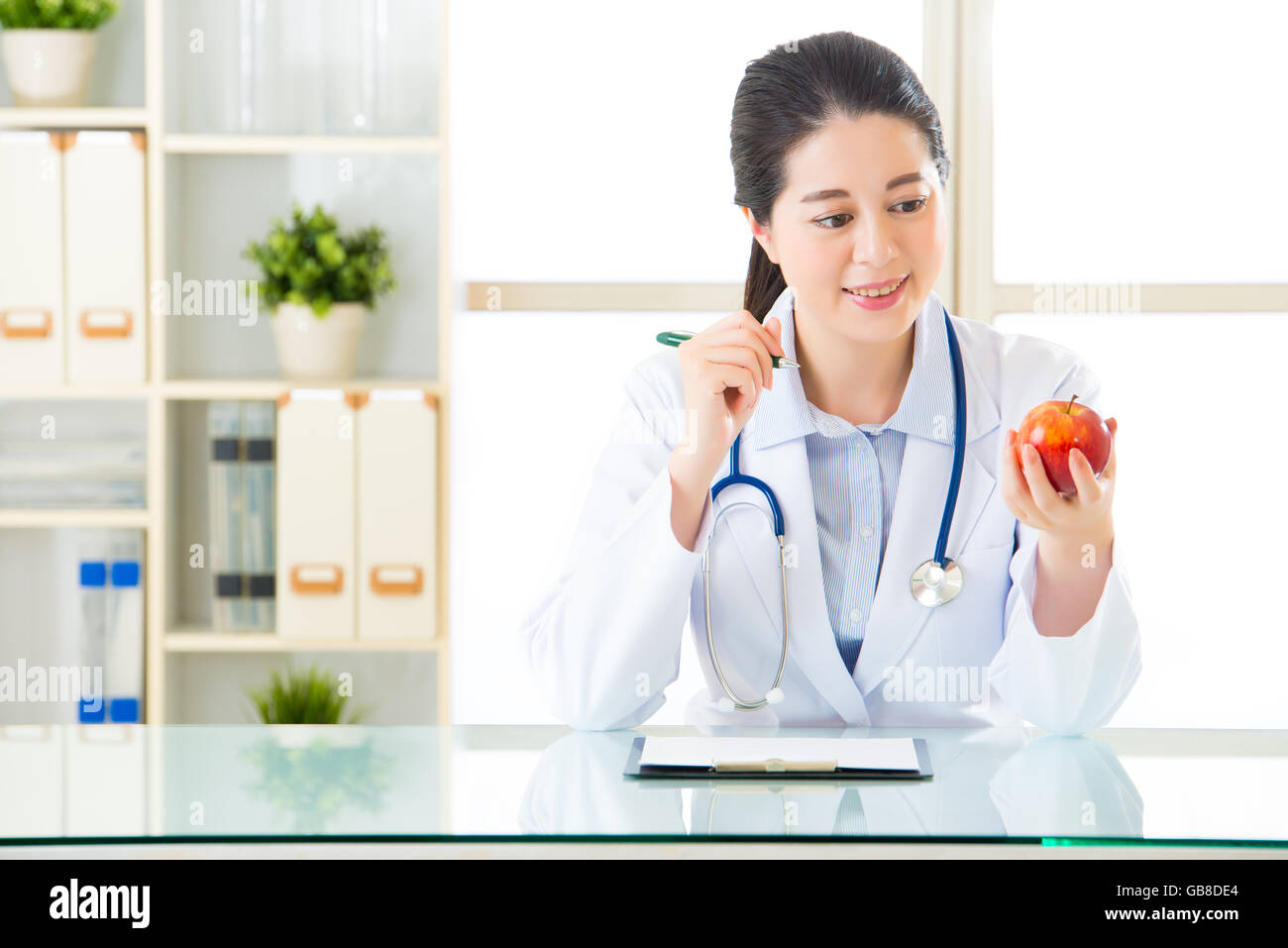 Young asian nutritionist doctor hi-res stock photography and images - Alamy
