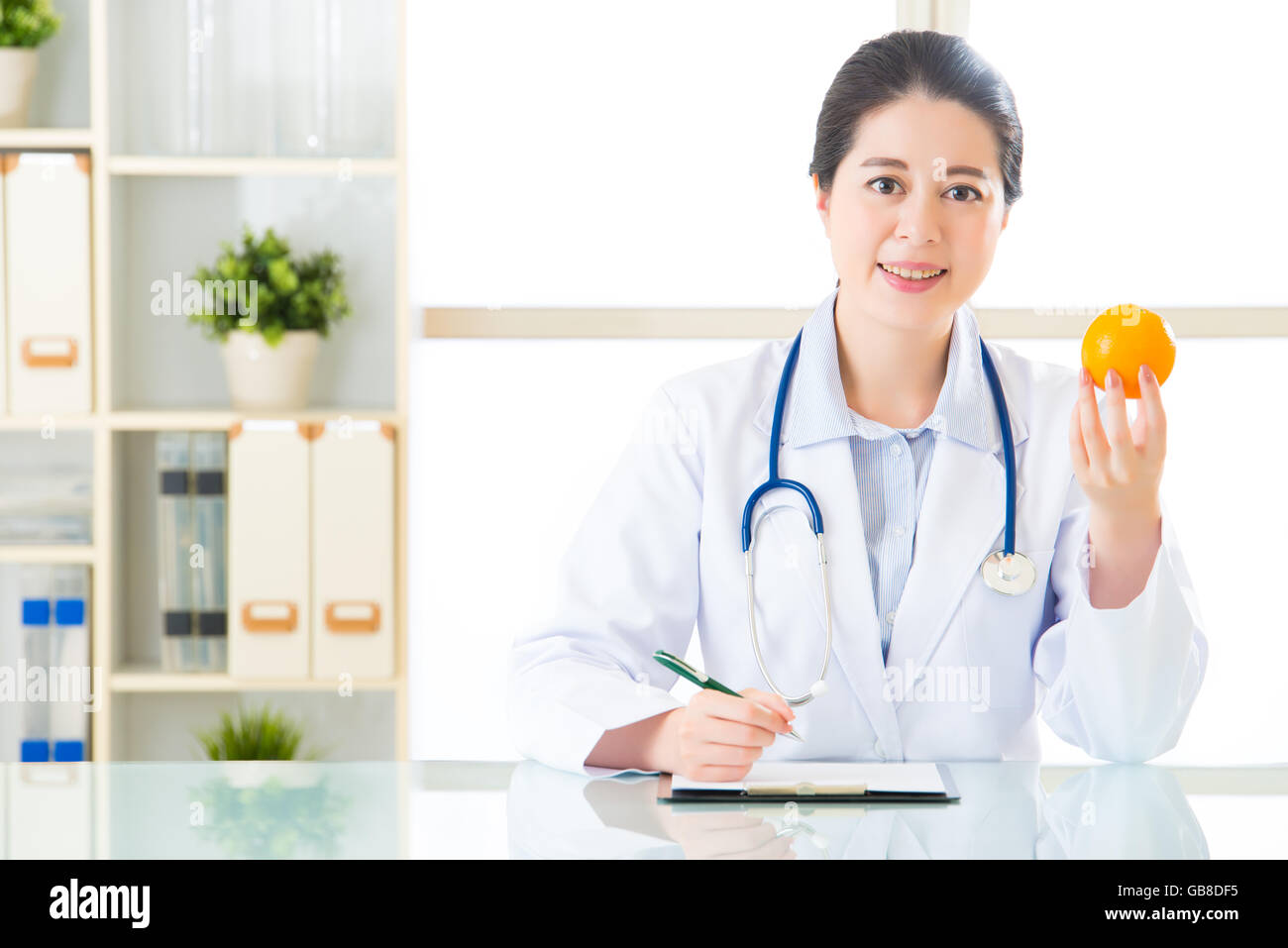 Young asian nutritionist doctor hi-res stock photography and images - Alamy