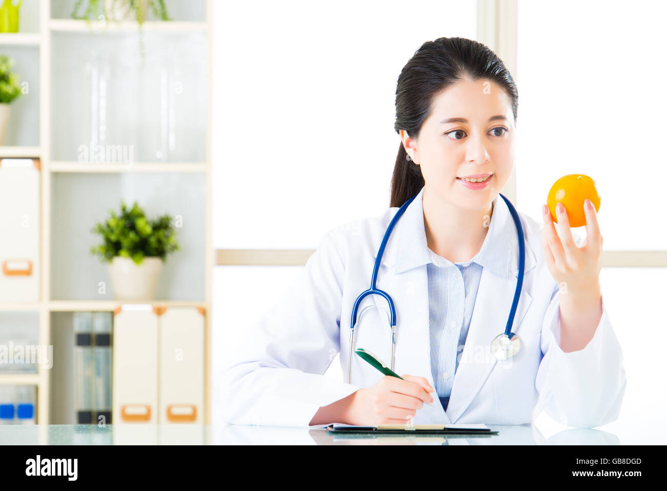 Young asian nutritionist doctor hi-res stock photography and images - Alamy