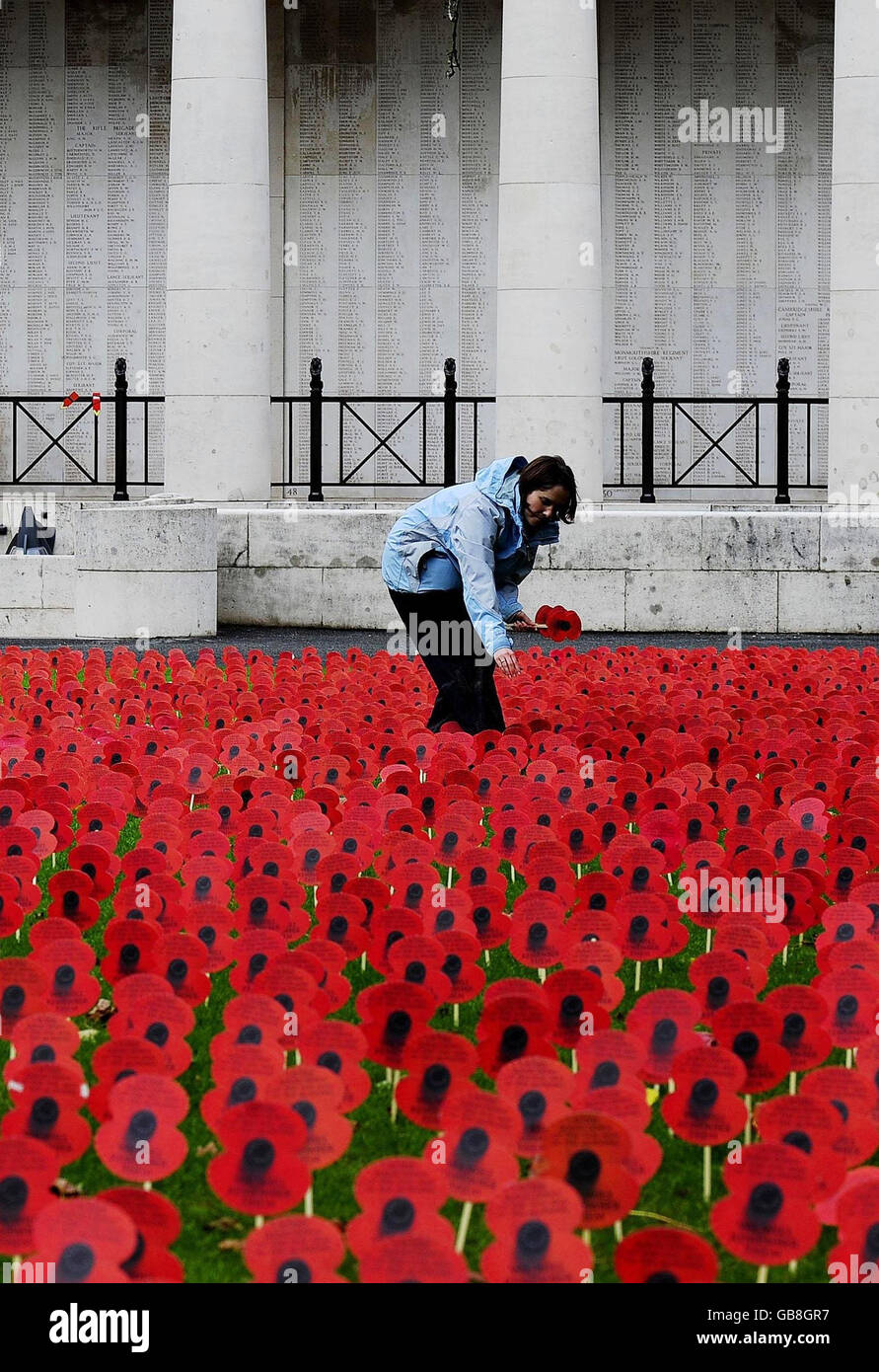 A Flanders Field of Poppies planted by teams from the British Legion added colour to the grass in front of the Menin Gate in Ypres, Belgium. Stock Photo