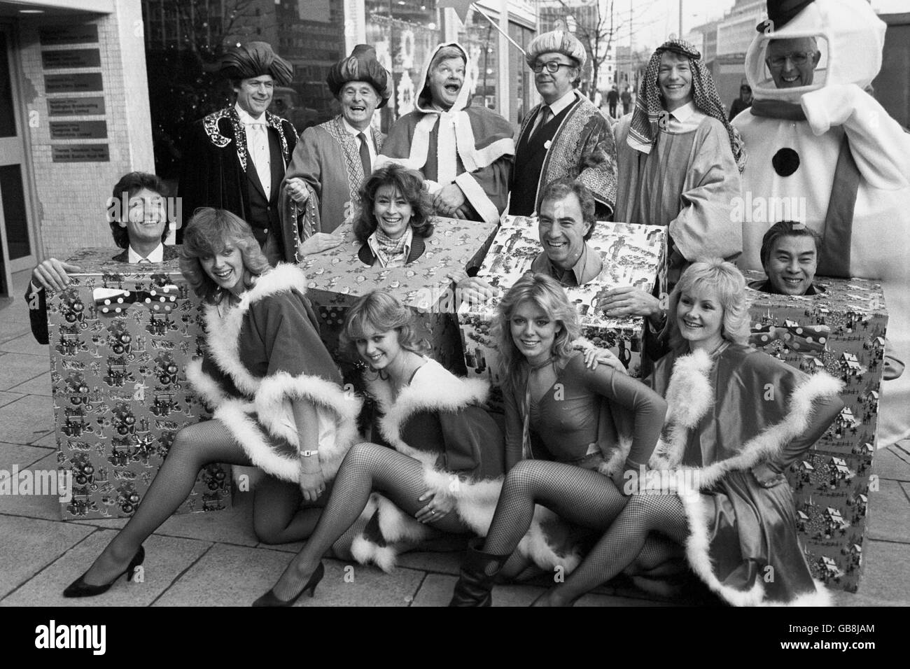 A gathering of Christmas TV stars from the holiday weekend on Thames TV. (back row l-r) Impressionist Mike Yarwood, comedians Ernie Wise, Benny Hill, Eric Morcambe and Jim Davidson. Also Weatherman Jack Scott. (middle row l-r) Singer Tony Monopoly, actress Nanette Newman, comedian Bernie Clifton and actor Bert Kwouk. (front row l-r) Hill's Angels Lesley Wood, Anita Ray, Lindsay Neil and Sue Upton. Stock Photo
