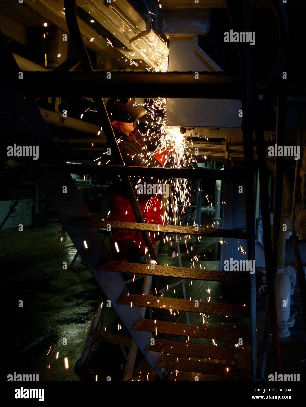A welder works on the RFA Fort as shipbuilders returned to work