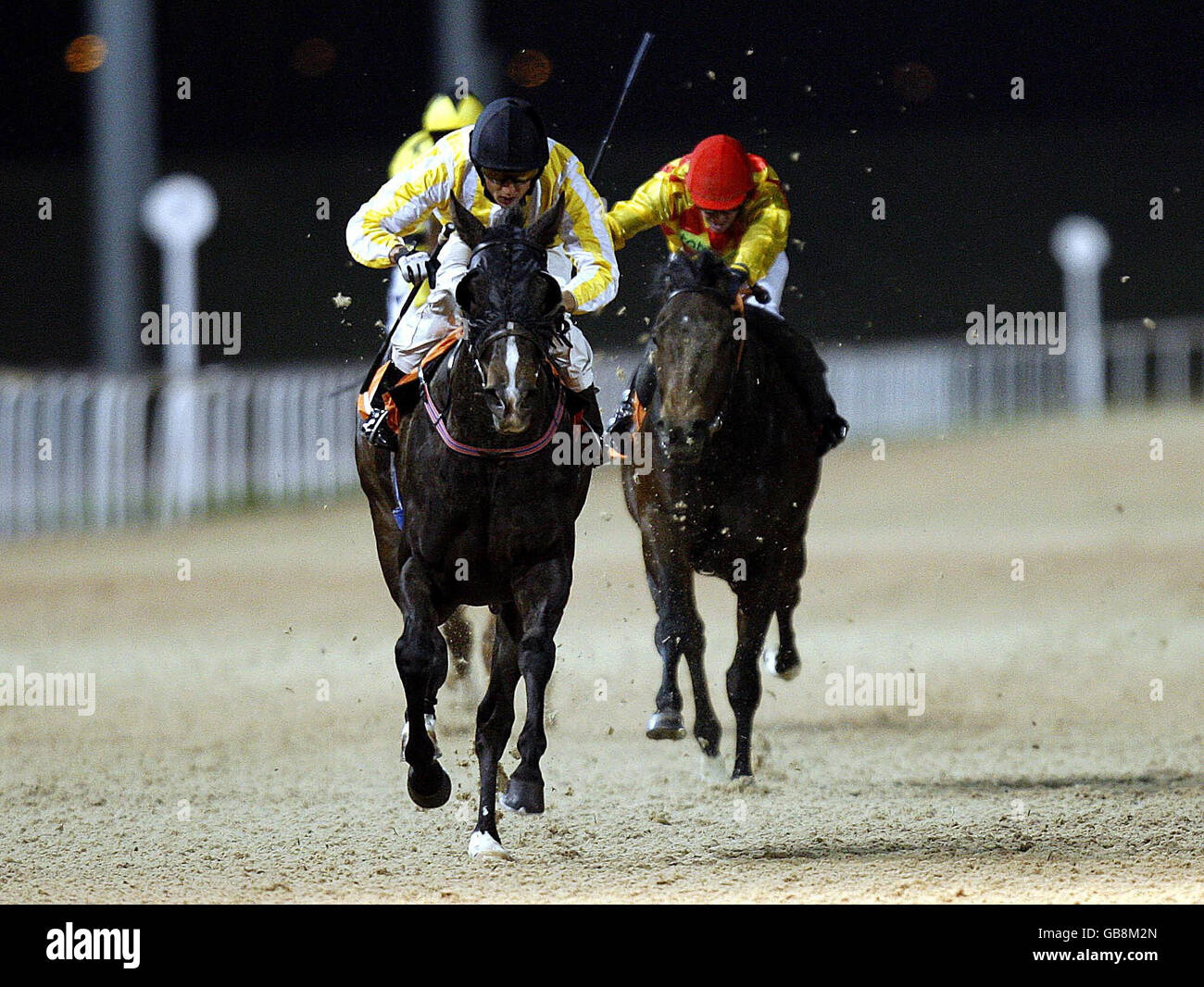 Horse Racing - Great Leighs Racecourse. Ivory Silk jockey Chris Catlin wins the Audley End Handicap at Great Leighs Racecourse, Chelmsford. Stock Photo