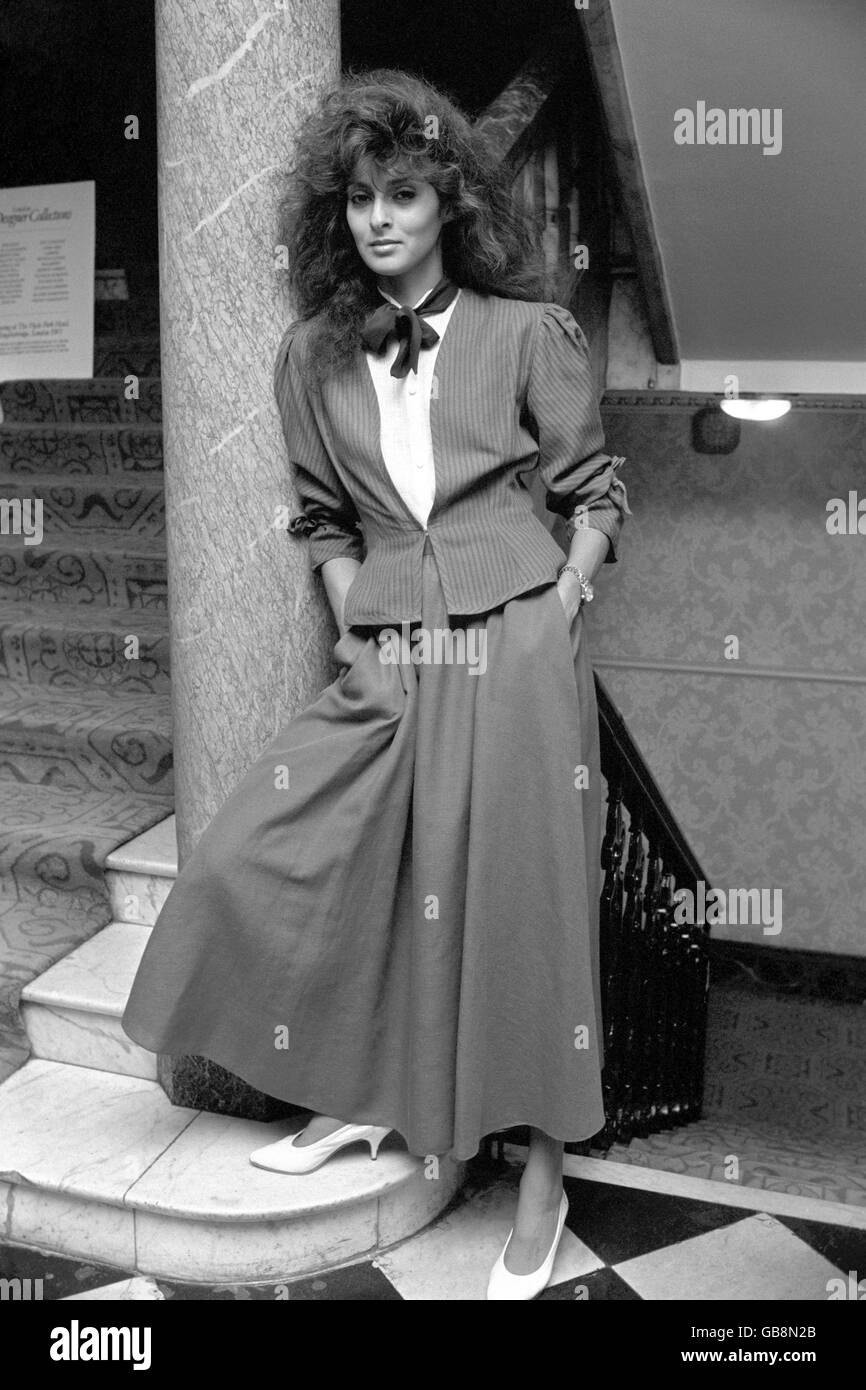 Model Cela wears an outfit designed by Jacques Azagury, one of the 23 top designers showing their spring/summer 1982 collections at London's Hyde Park Hotel. Stock Photo