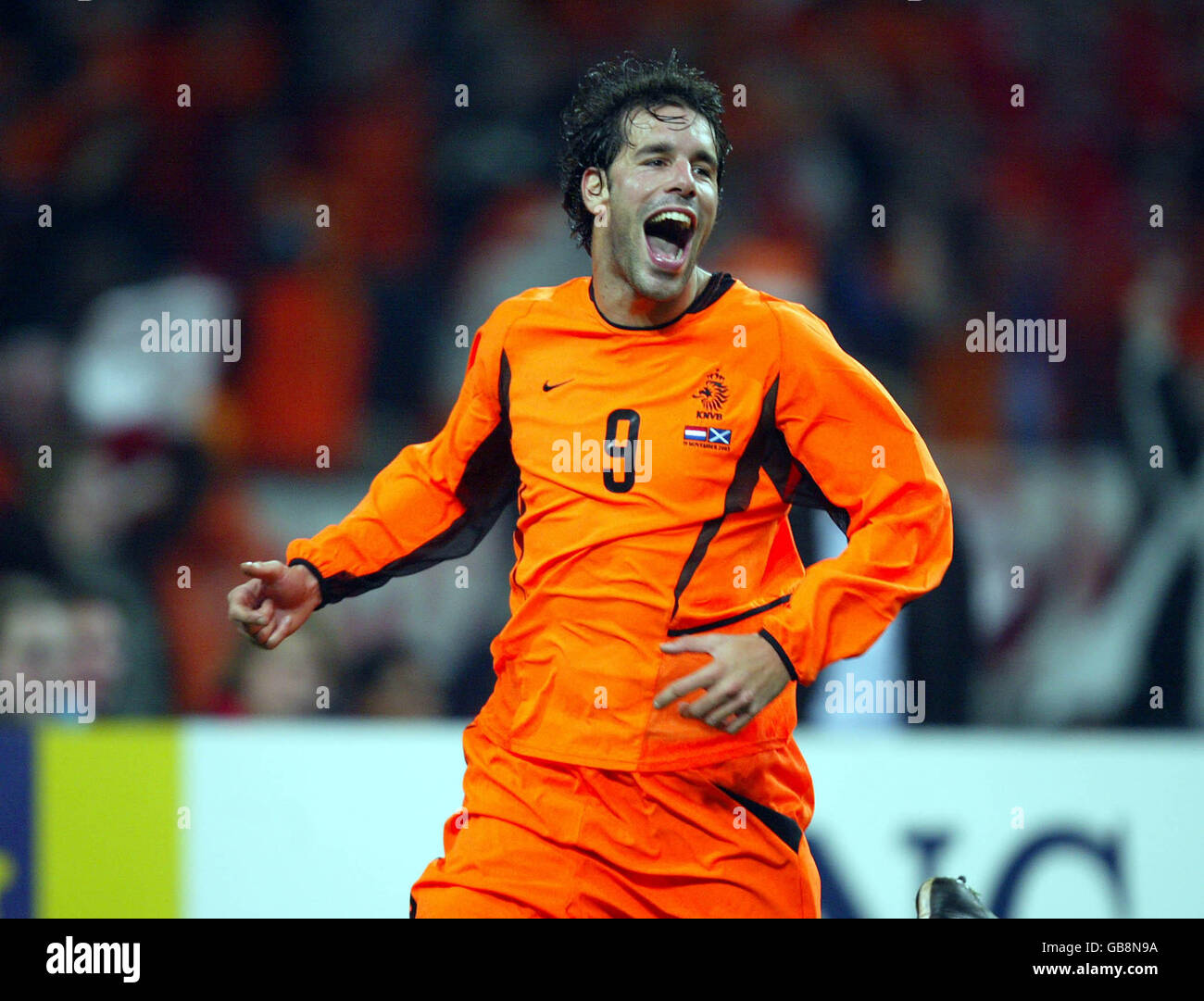 Holland's Ruud van Nistelrooy celebrates after scoring his hat-trick goal  against Scotland Stock Photo - Alamy