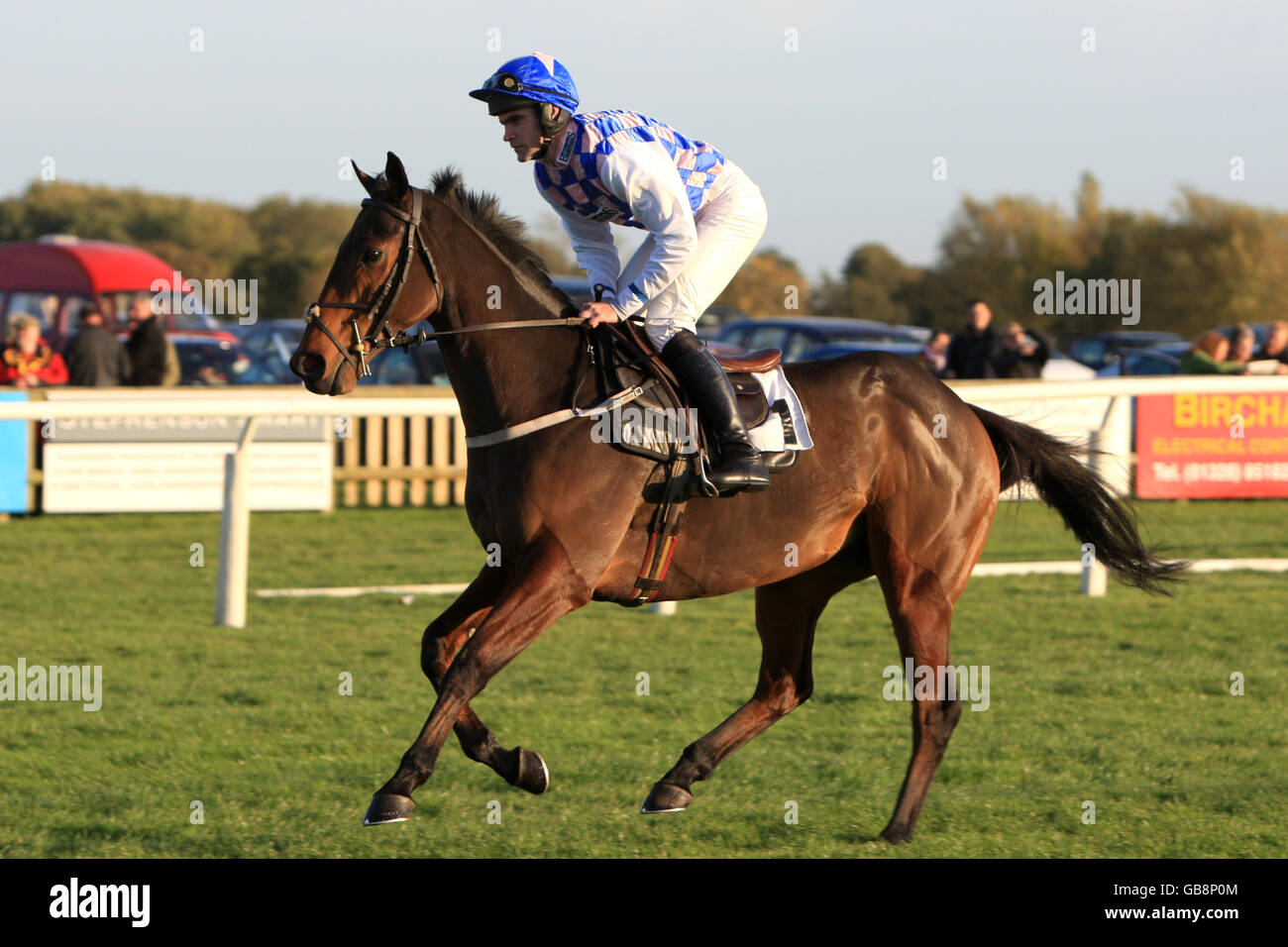 Horse Racing - Fakenham Racecourse. What's Up Doc ridden by Donal Fahy goes to post Stock Photo