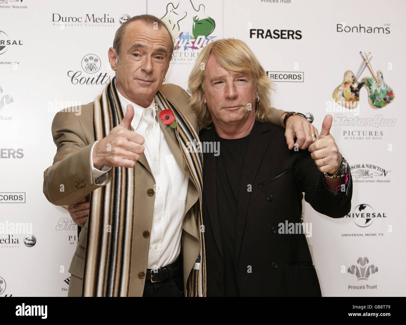 Francis Rossi (left) and Rick Parfitt of Status Quo at the release of their album 'Pictures:40 Years of Hits' with an auction in aid of The Prince's Trust, at Bonhams, New Bond Street, central London. Stock Photo