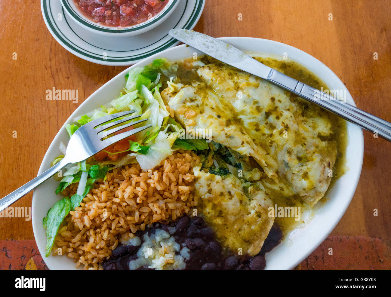 Spinach and cheese enchiladas with black beans, brown rice, salad, and ...