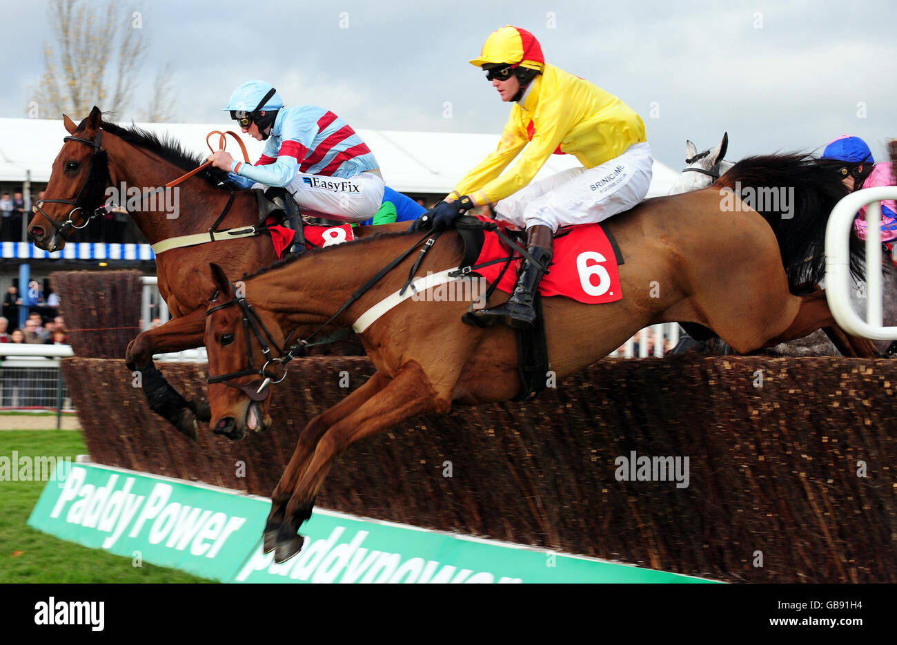 Jockey Joe Tizzard riding Joe Lively wins the Servo Computer Services Trophy Handicap Steeple Chase during The Open at Cheltenham Racecourse. Stock Photo