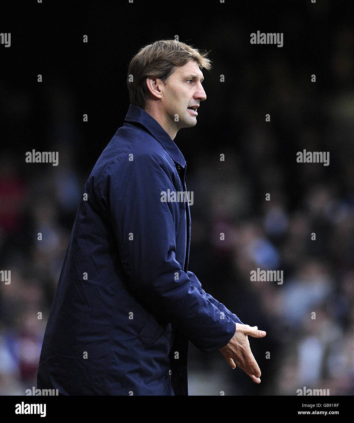 Soccer - Barclays Premier League - West Ham United v Portsmouth - Upton Park. Portsmouth manager Tony Adams gestures on the touchline Stock Photo