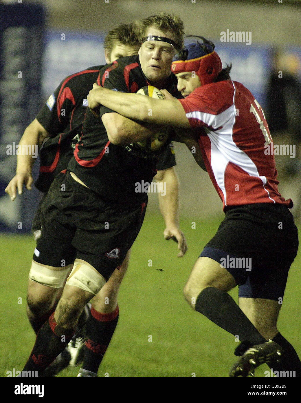 Edinburgh's Craig Hamilton (left) tackled by Georgia's David Kacharava ...