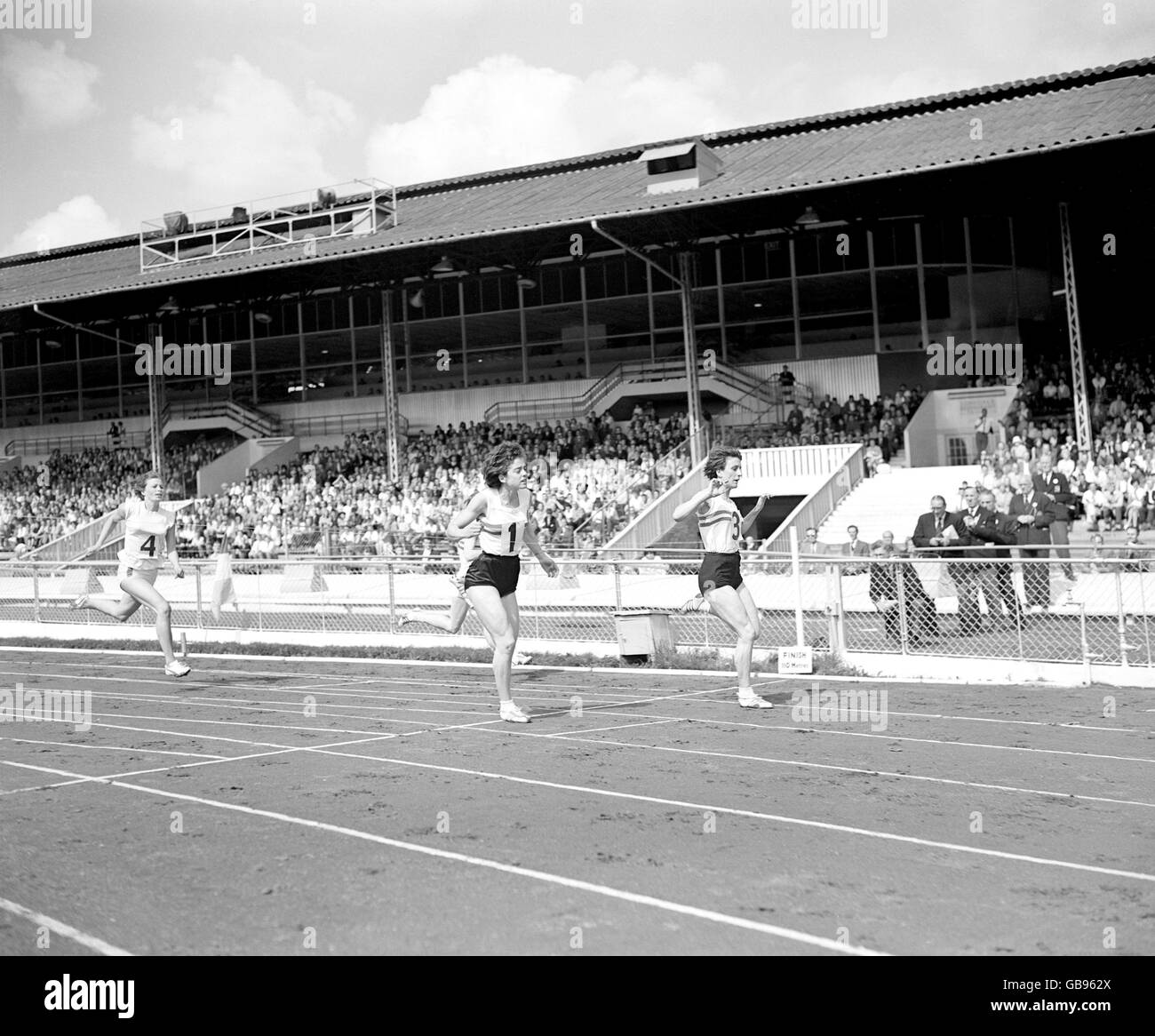 Athletics - British Games - White City. Dorothy Hyman (r) wins the women's 100m from Daphne Arden (l) Stock Photo