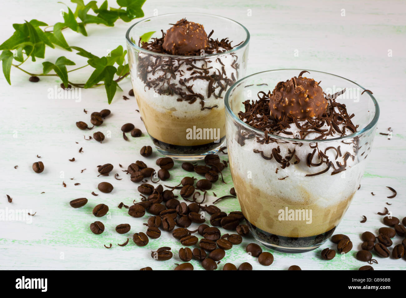 Chocolate dessert in glasses. Cocoa cocktail. Cocoa drink. Coffee