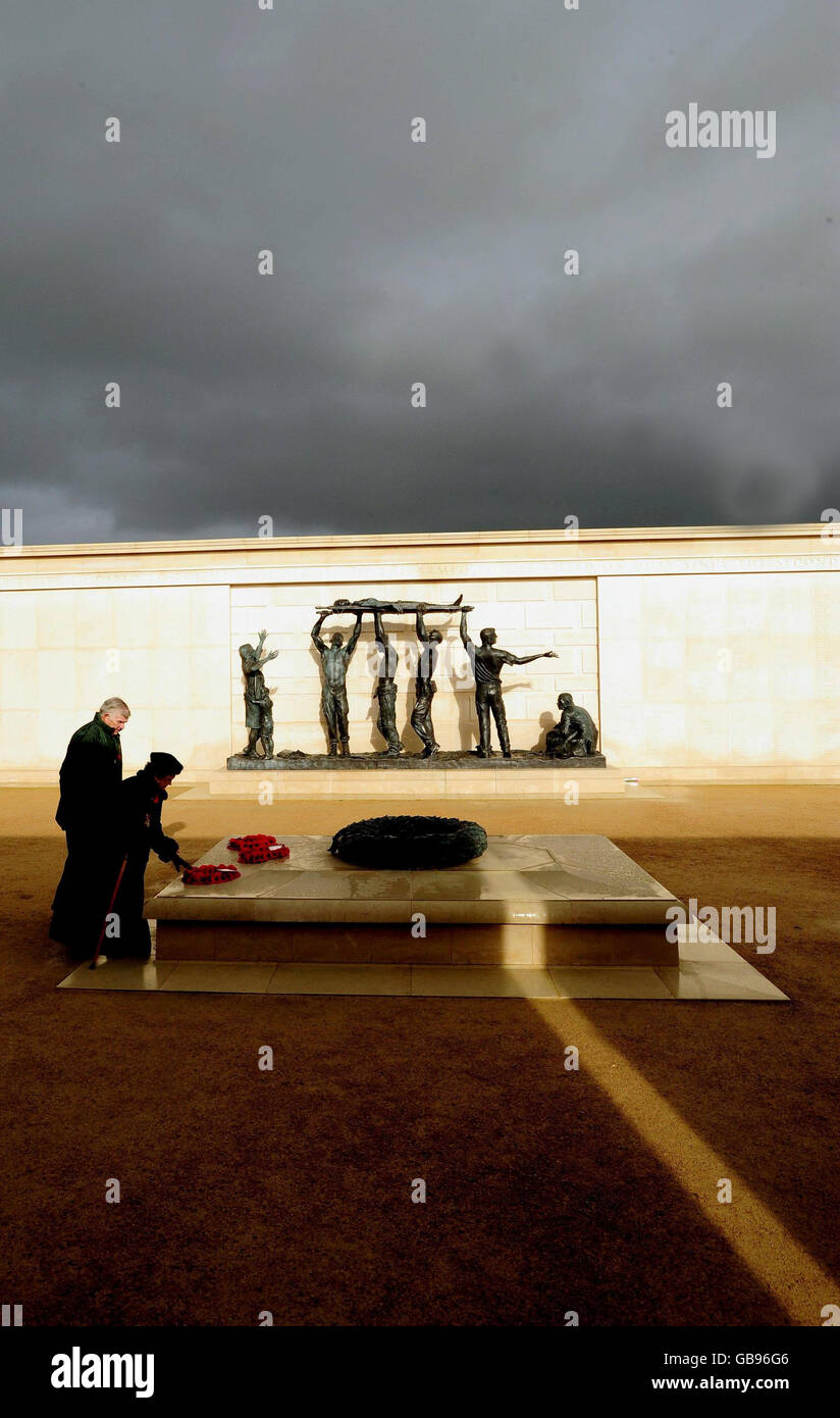 People lay wreaths during a Remembrance service at The National ...