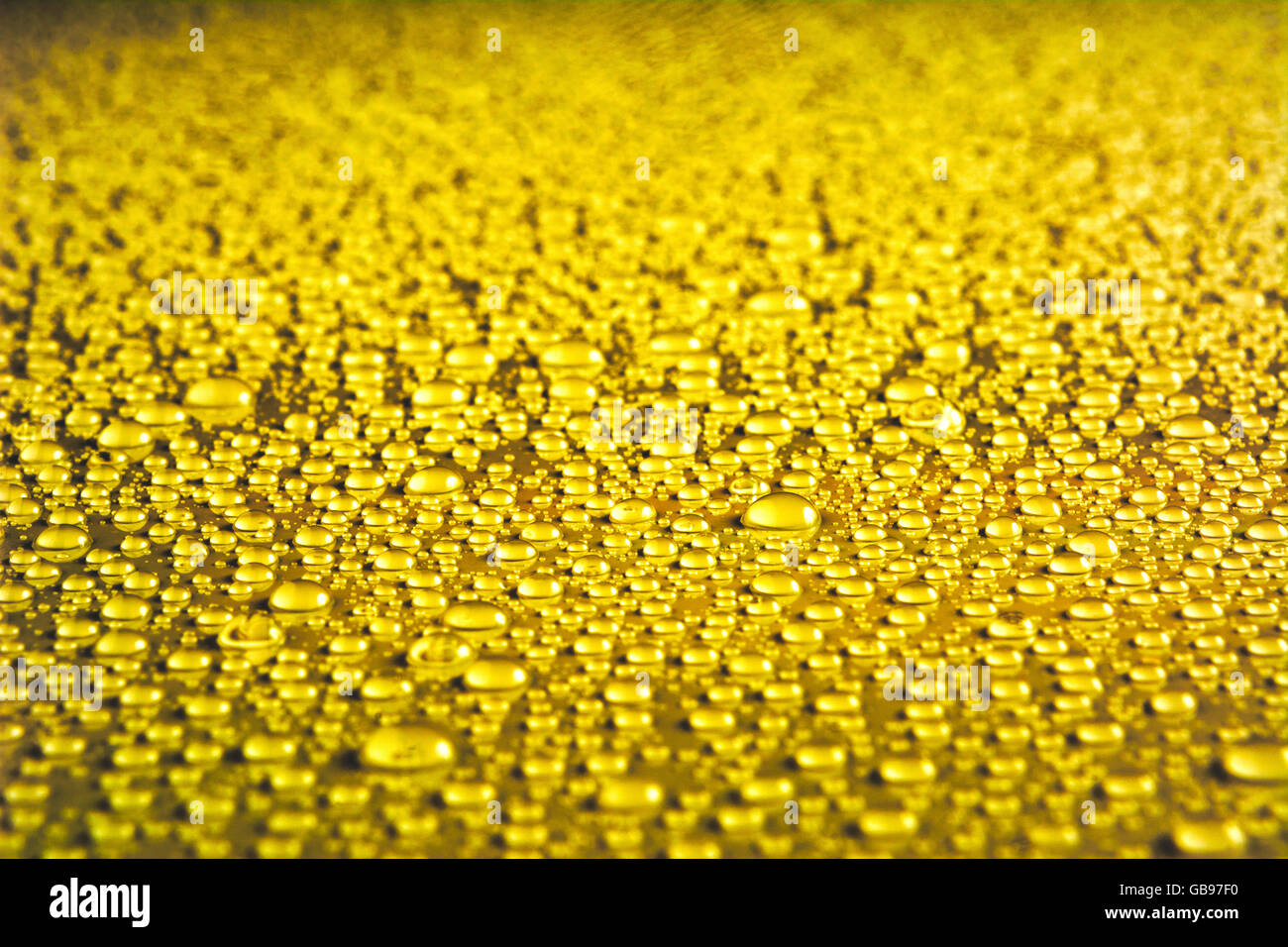 Golden drops texture. Water drop background Stock Photo