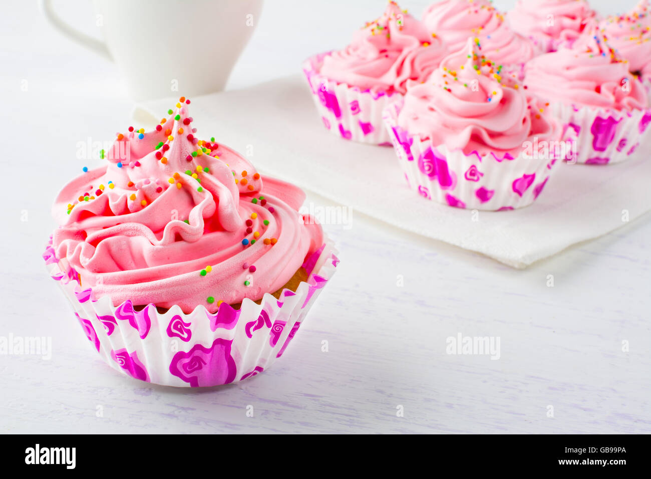 Pink delicious cupcakes.Selective focus. Birthday cupcakes. Homemade cupcake. Sweet cupcake. Gourmet cupcakes. Sweet dessert. Stock Photo