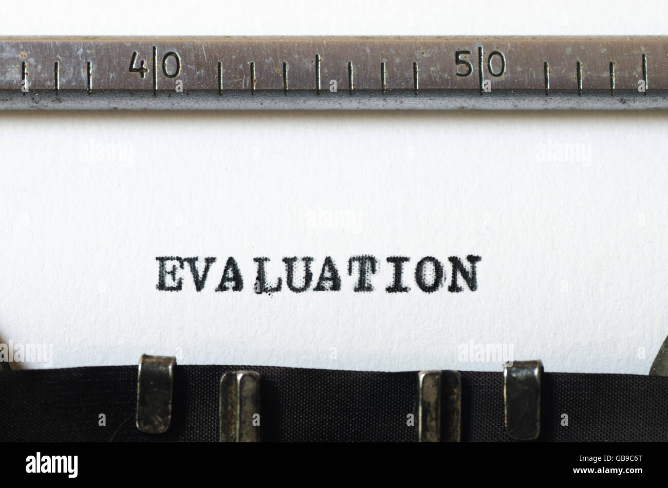 word evaluation typed on old typewriter Stock Photo