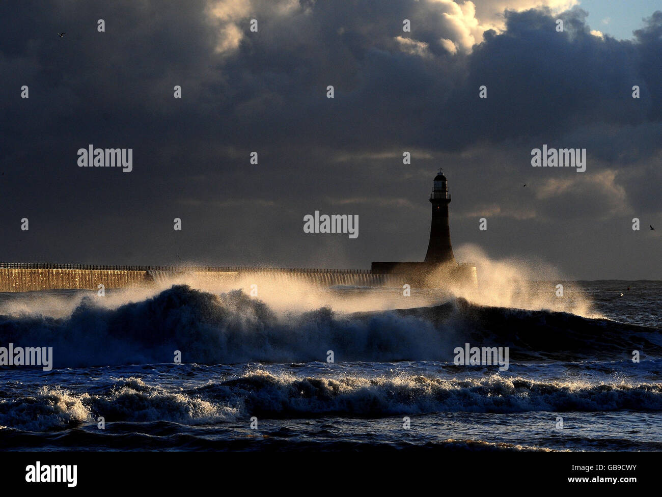 Storm waves hit Seaham lighthouse in Sunderland as an arctic weather front hits the east coast. Stock Photo