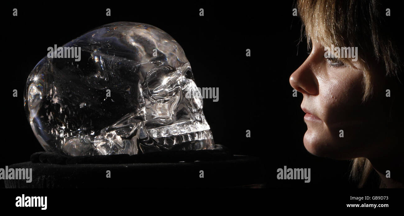 Robyn Smith views The Skull of Doom, said to have inspired the latest Indiana Jones film, on display at the Histories and Mysteries conference in the Hub in Edinburgh. Stock Photo