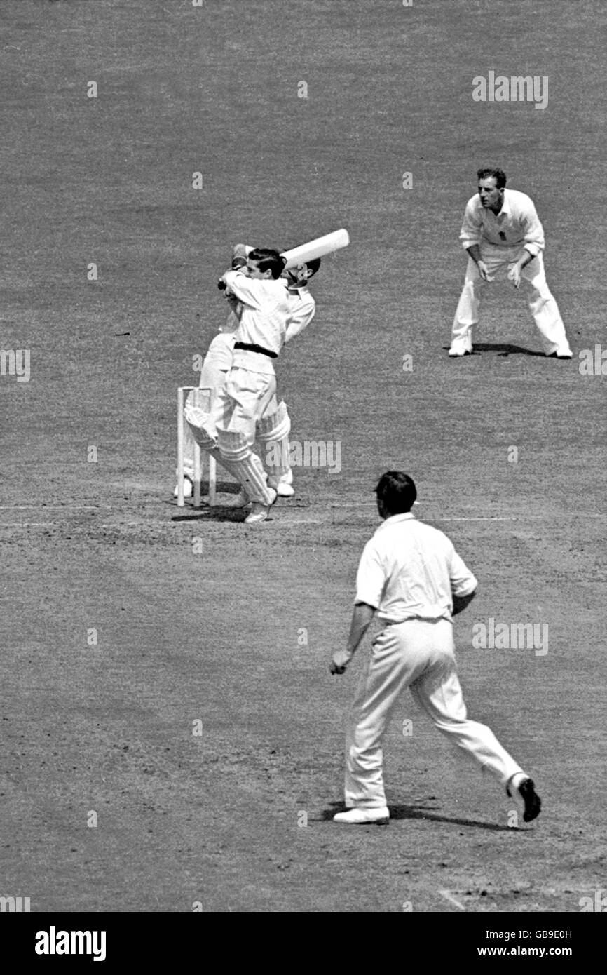 Cricket - The Ashes - Fourth Test - England v Australia - Third Day. Australia's Neil Harvey (c) pulls England's Kenneth Cranston (bottom) for four Stock Photo