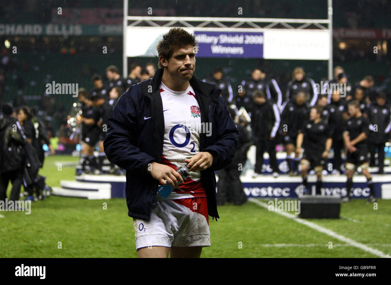 England's Michael Lipman leaves the field as New Zealand are awarded the Hilary Shield following during the Investec Challenge Series match at the Twickenham, London. Stock Photo