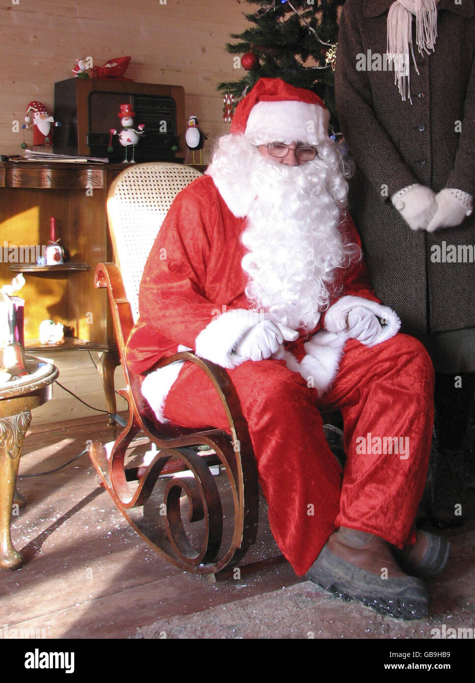 Santa in his grotto at Lapland New Forest at Matchams Leisure Park near Ringwood, where Dorset Trading Standards have received hundreds of complaints from visitors to the seasonal attraction who claimed it did not live up to what was advertised.. Stock Photo