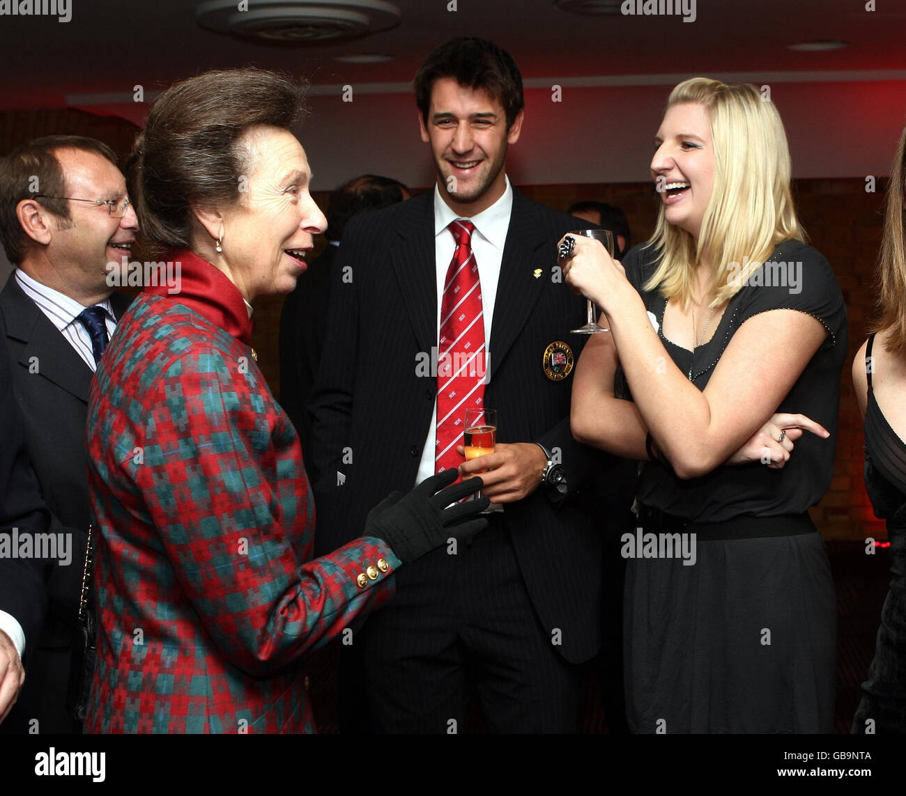 HRH The Princess Royal chats with Rebecca Adlington and Tom James before the Sport Journalists' Association Awards at The Brewery, London. Stock Photo