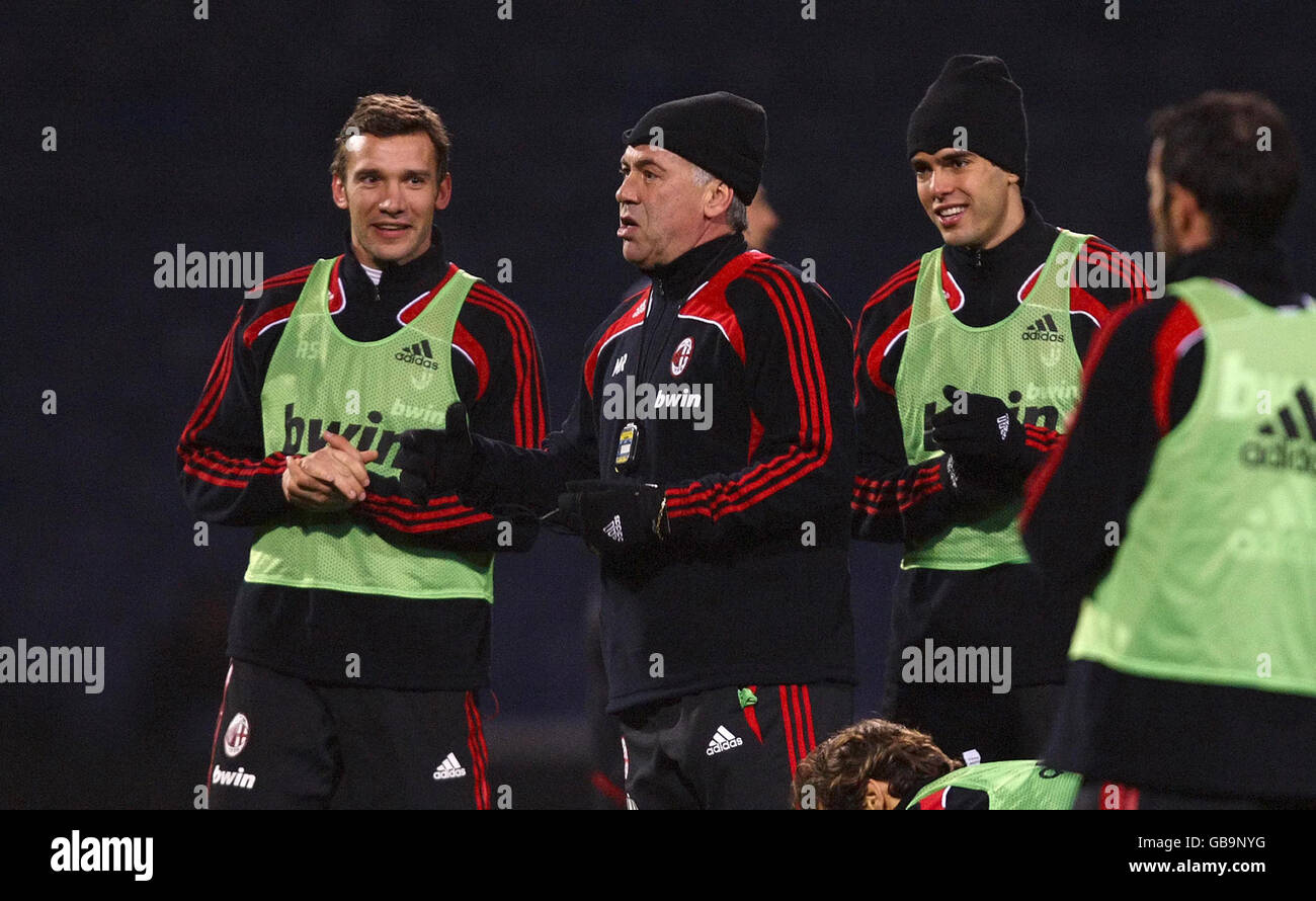 AC Milan Manager Carlo Ancelotti(centre) with Andriy Shevchenko (left) and Kaka (right) during a training session at Fratton Park, Portsmouth. Stock Photo