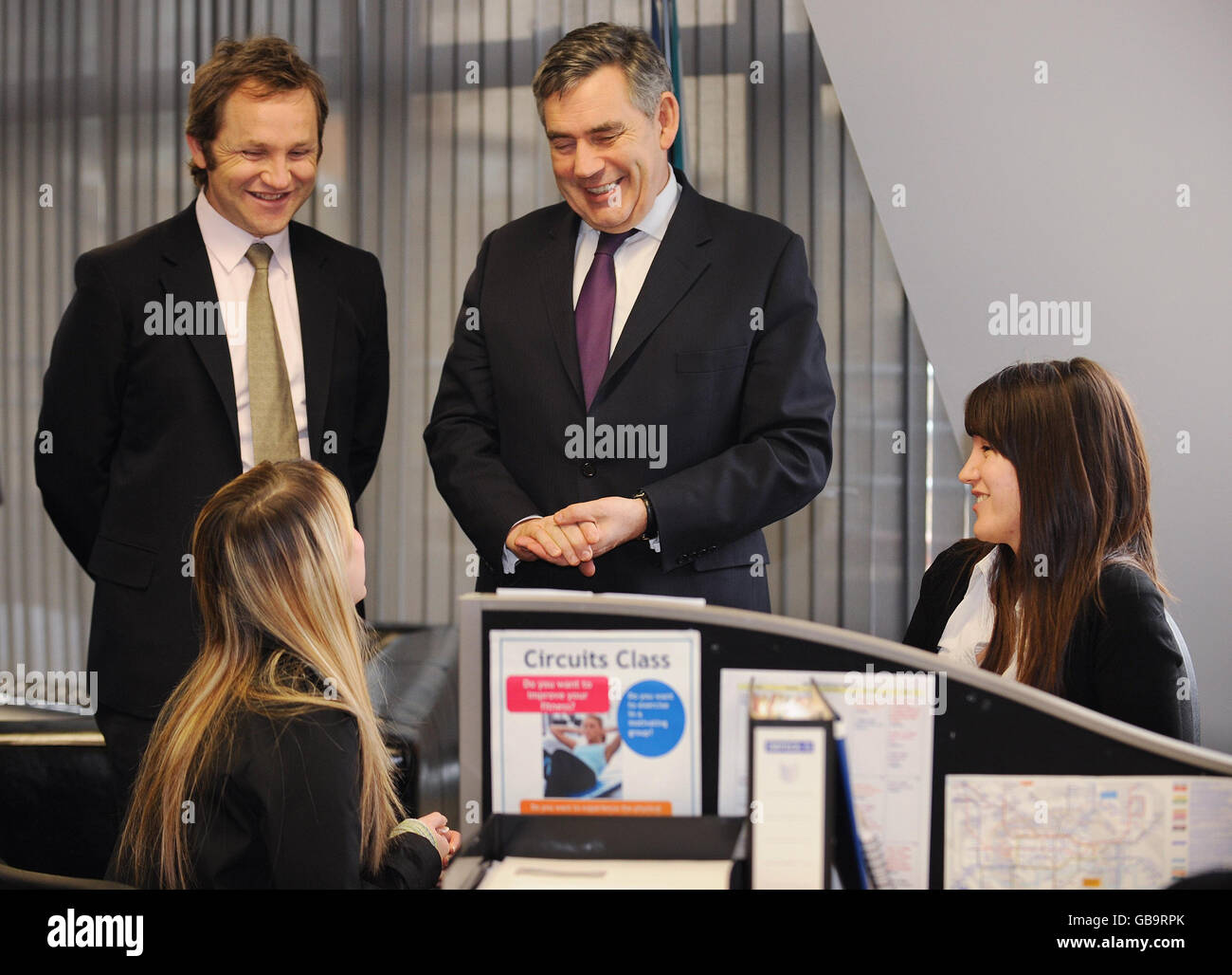 Britain's Prime Minister Gordon Brown (centre) and Work and Pensions Secretary James Purnell during a visit to Work Directions in London's King's Cross, which is a private sector organisation providing employment support and advice to those on incapacity benefit or income support. Stock Photo