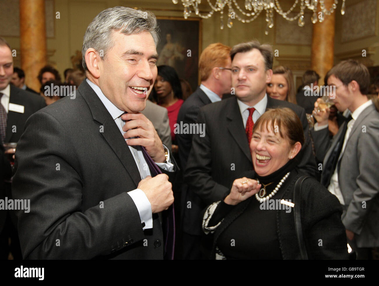 Prime Minister Gordon Brown speaks to Dame Julia Cleverdon, Chair of Teach First, at a reception for Teach First at Ten Downing Street, Westminster, London. Stock Photo