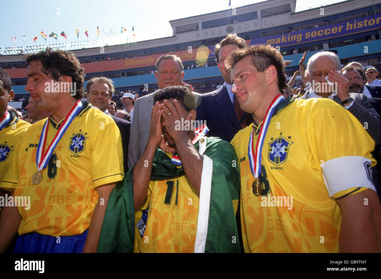 UEFA President Lennart Johansson (back c) and US Vice-President Al Gore (back second r) look on as Brazil celebrate their victory; Branco (l) and Dunga (r) look exhausted while Romario (c) and Brazilian FIFA President Joao Havelange (back r) become a little emotional Stock Photo