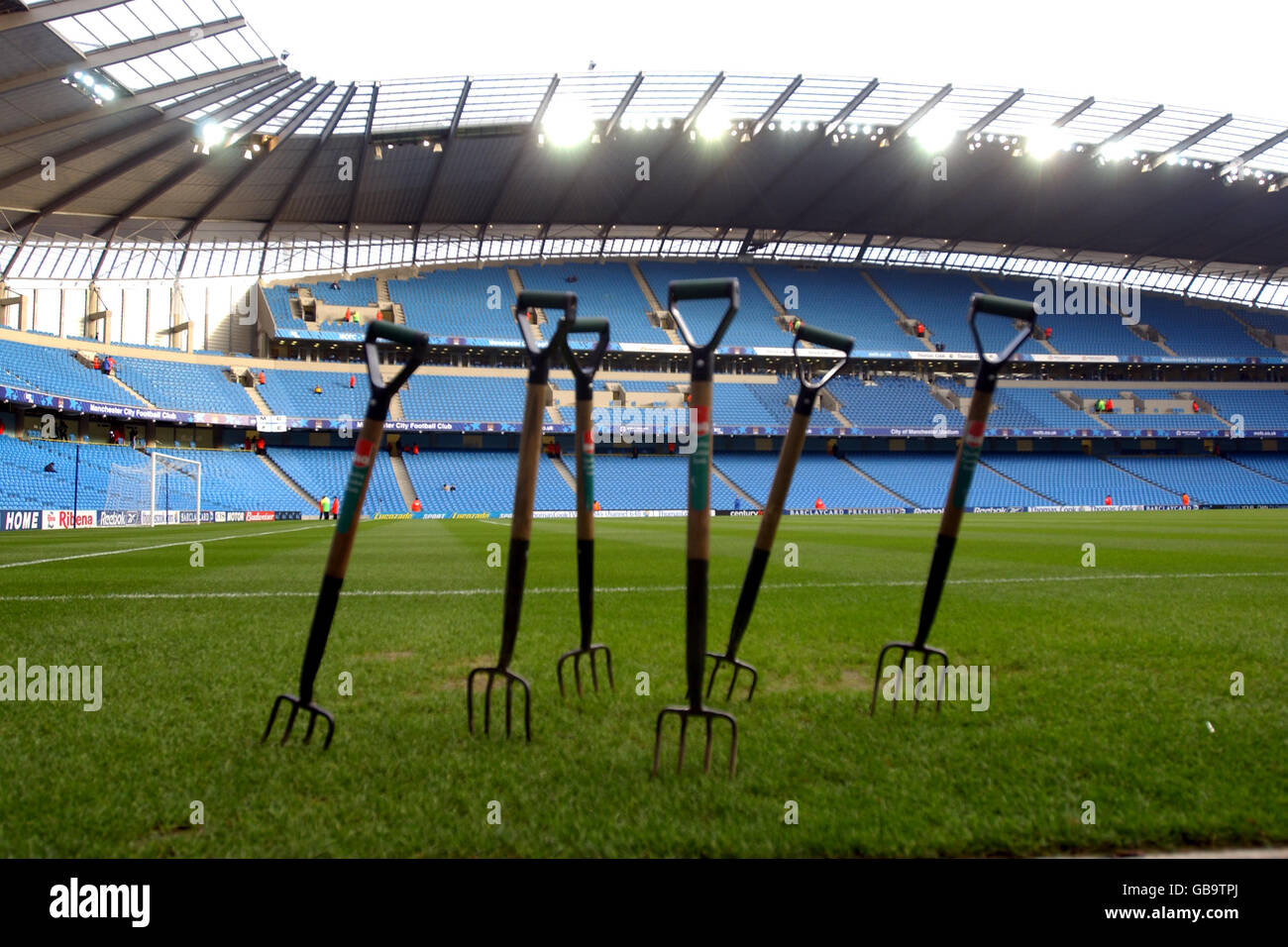 Forks in the grass at the City of Manchester Stadium, home of
