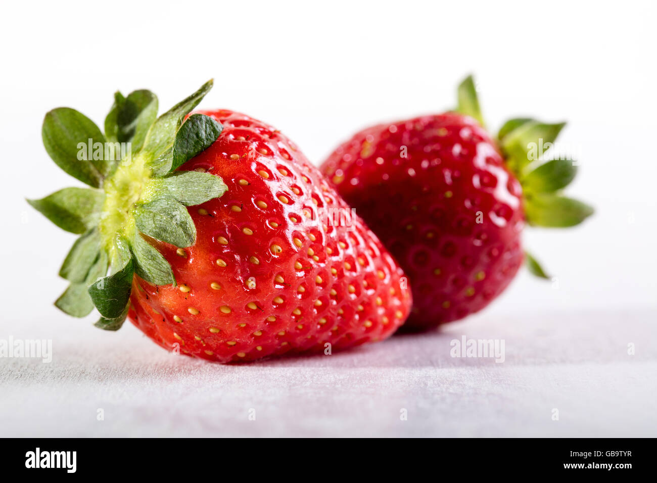 Two juicy strawberry on the table Stock Photo
