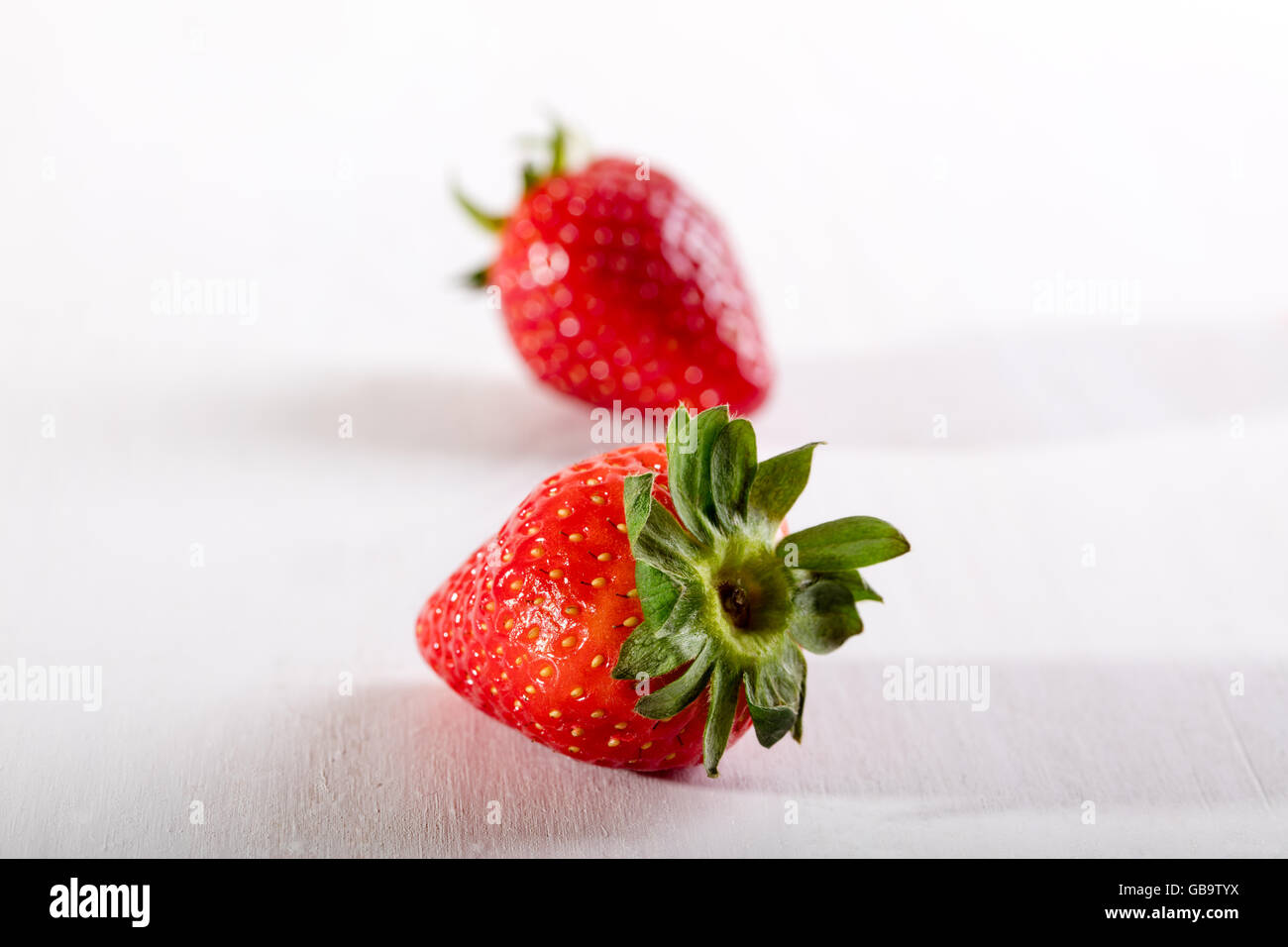 Two juicy strawberry on the table Stock Photo